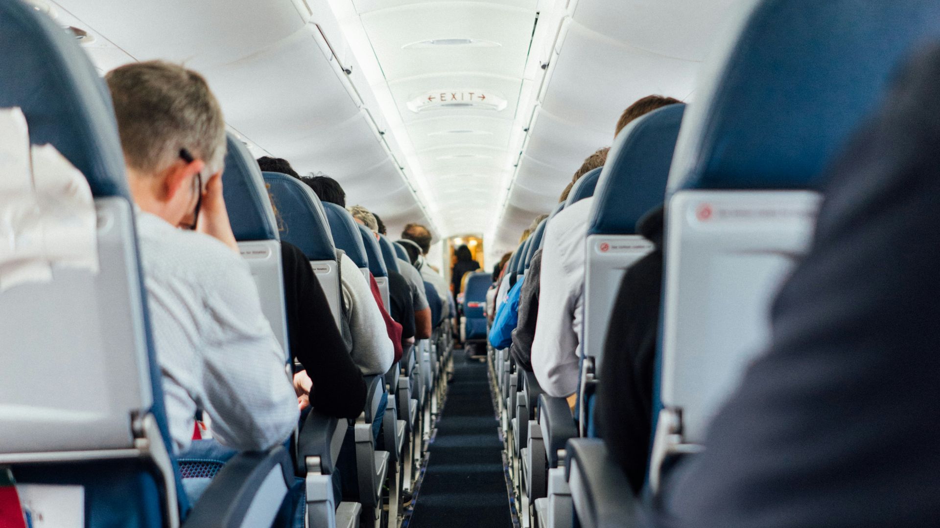 people sitting inside plane