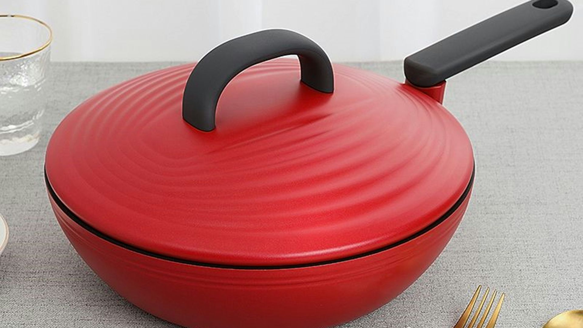 red round plastic container on table