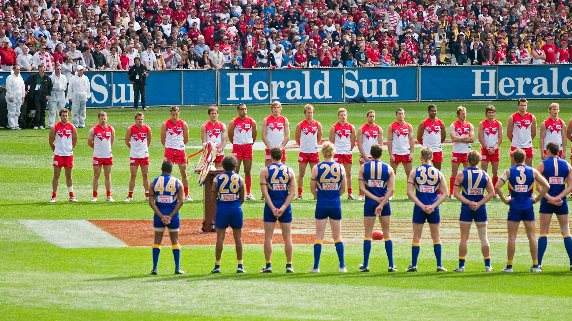 File:The teams line up for the national anthem, 2005 AFL Grand Final.jpg