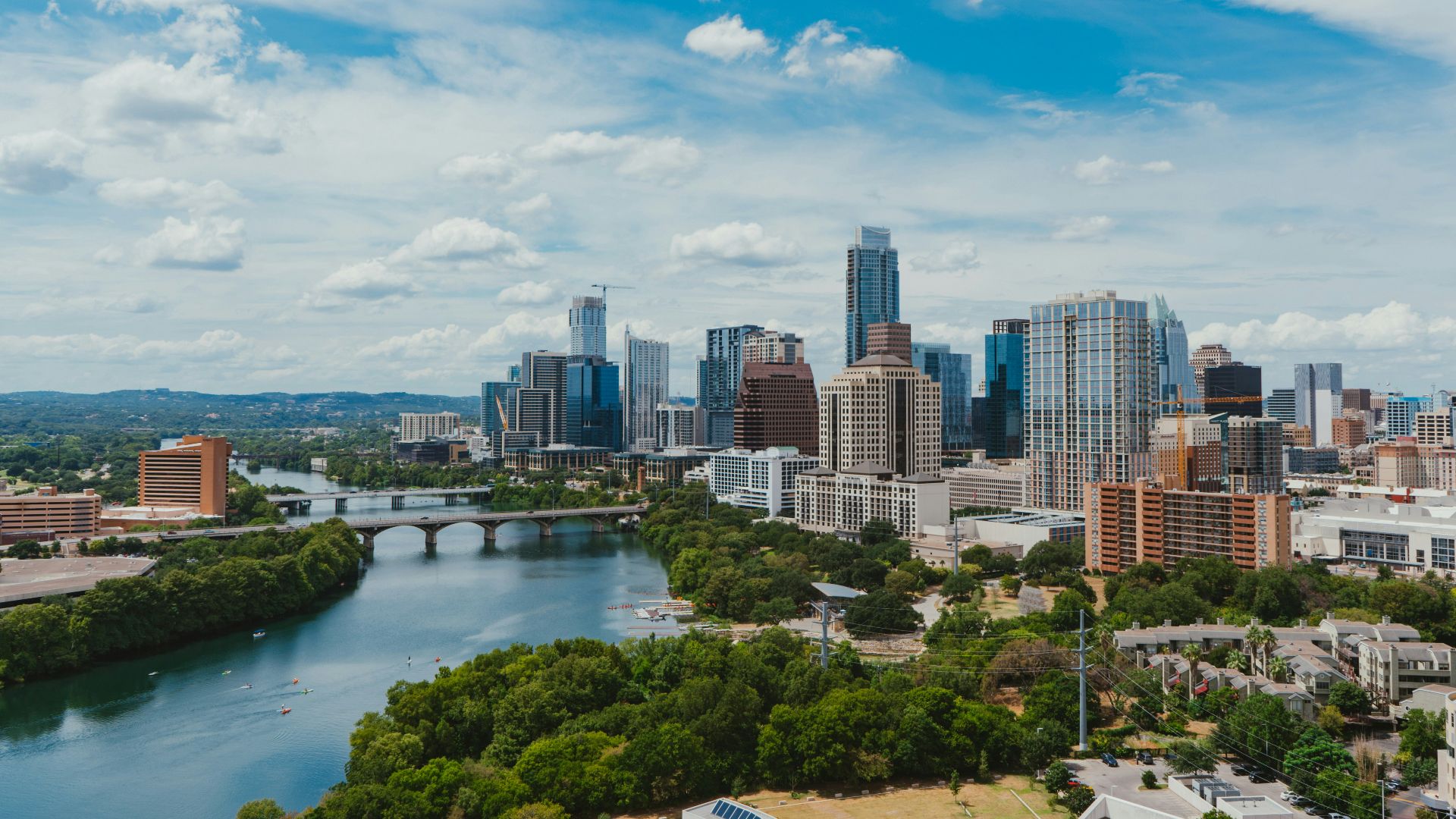 river near buildings during daytime