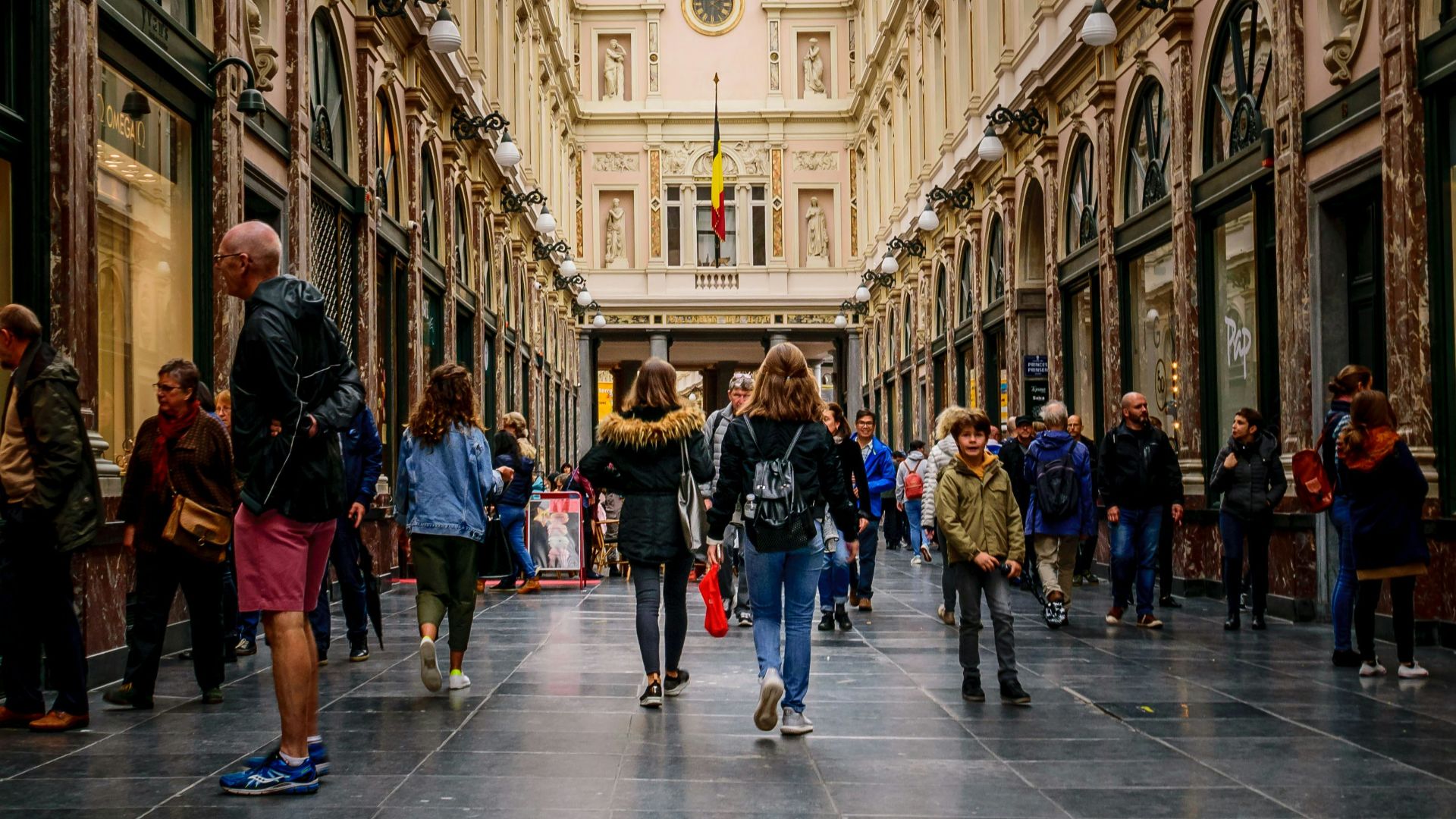 busy people walking on hallway