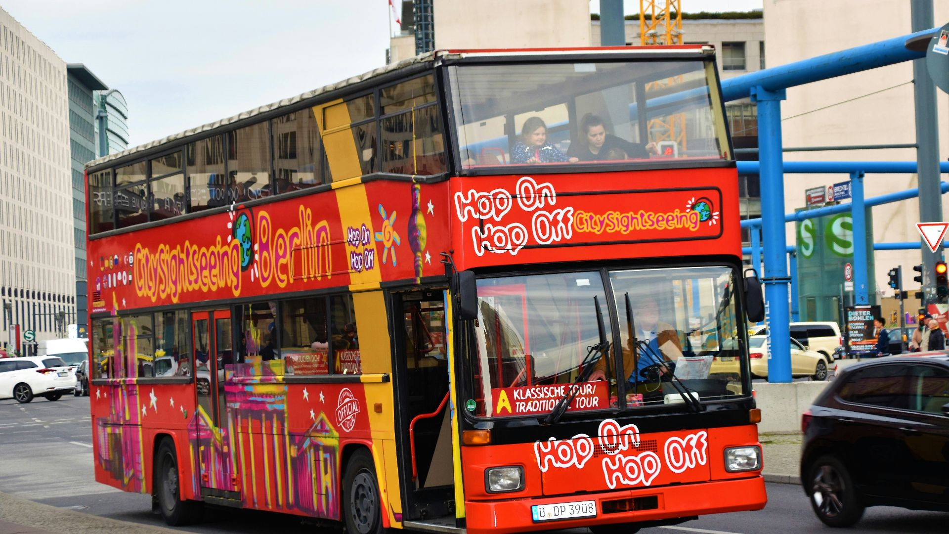 red double deck bus during daytime