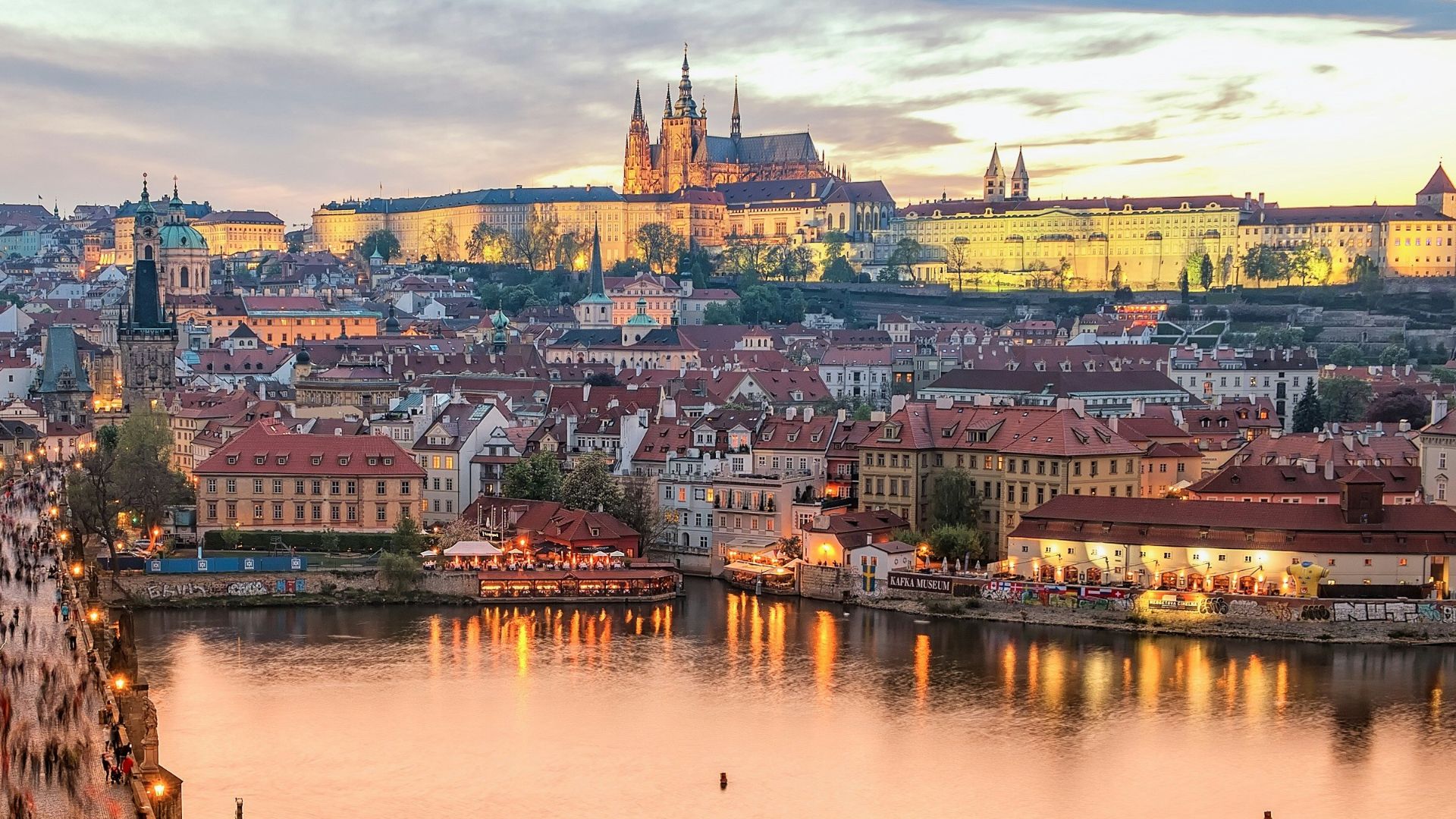 brown concrete building near body of water during daytime