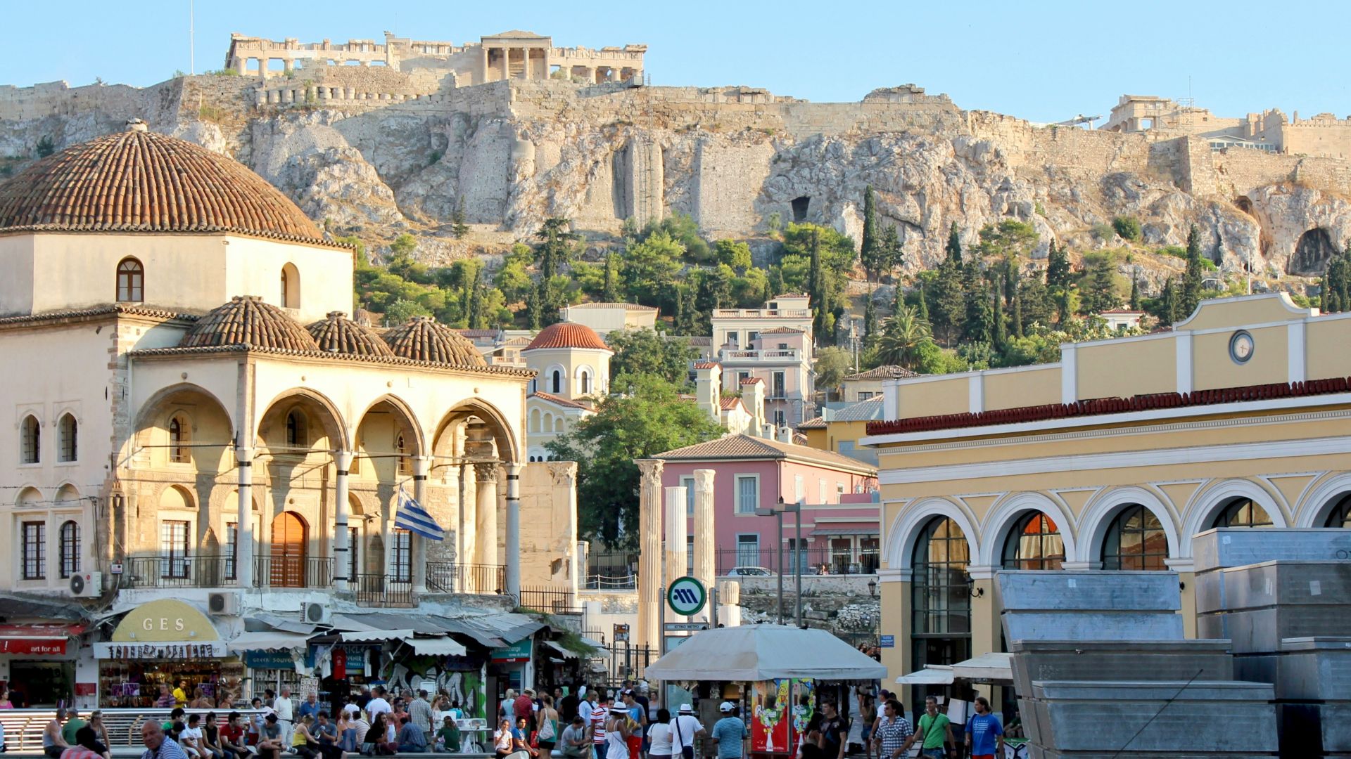people walking on street near brown concrete building during daytime