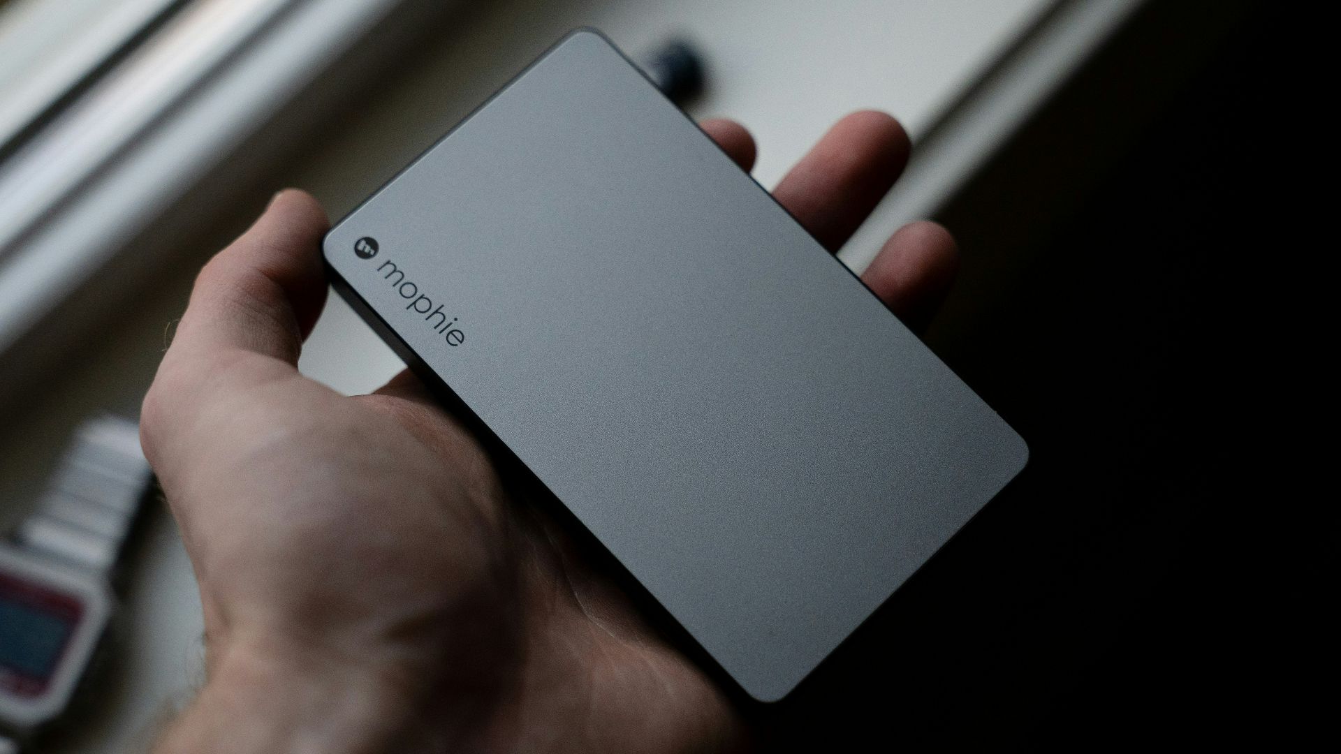 person holding white huawei smartphone