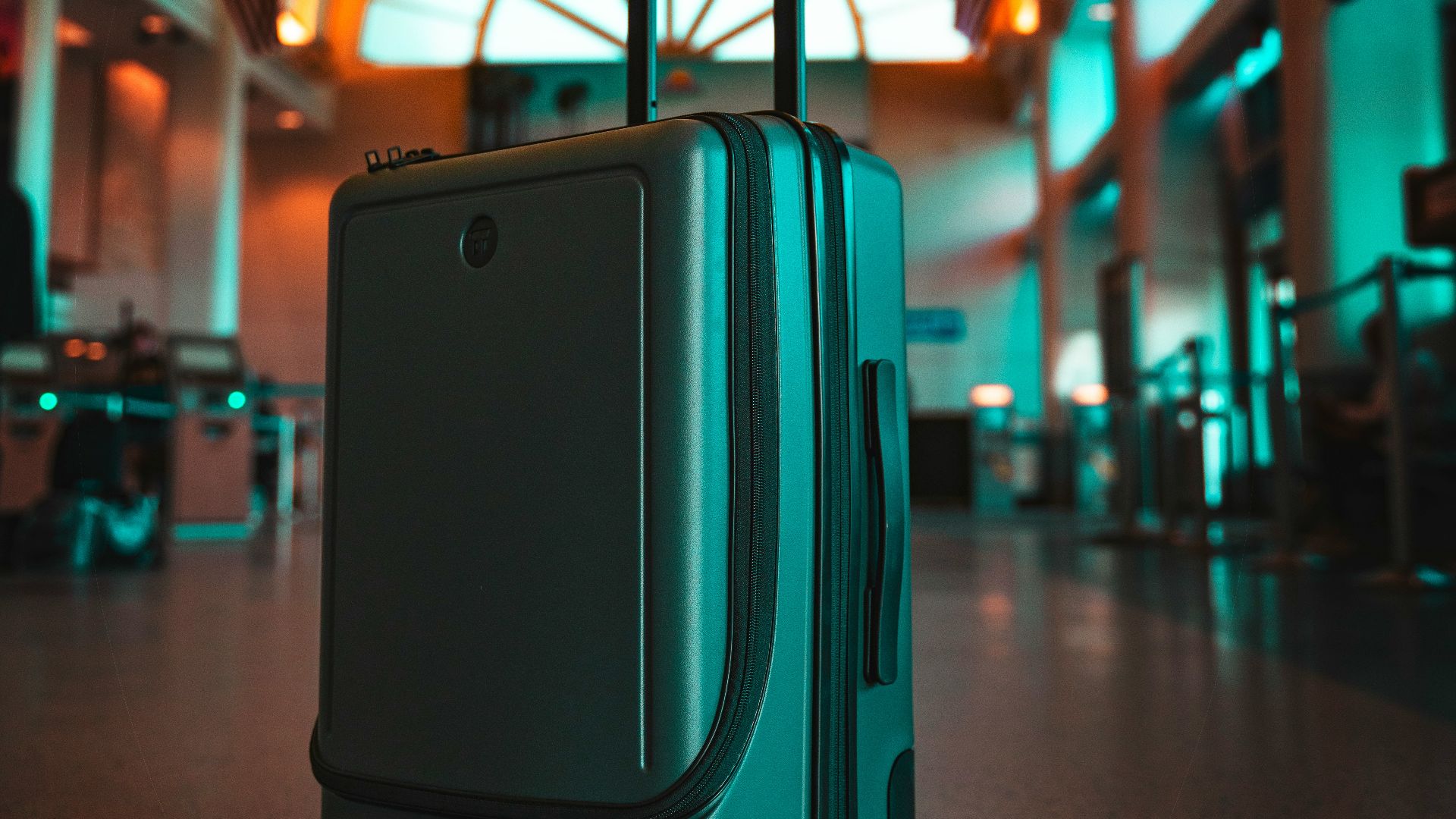a piece of luggage sitting in an airport