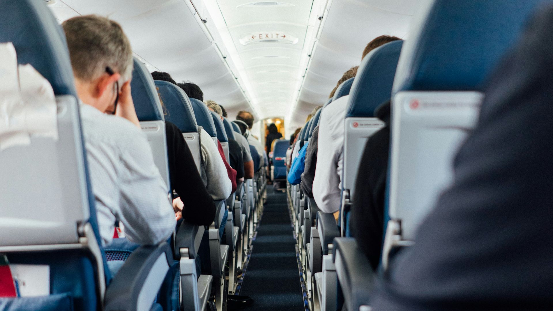 people sitting inside plane