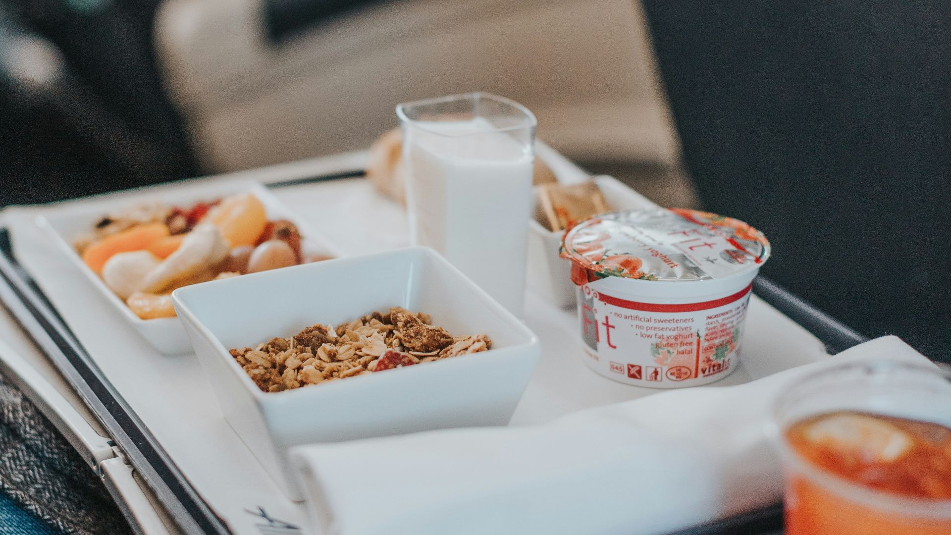 red liquid on cup beside bowl