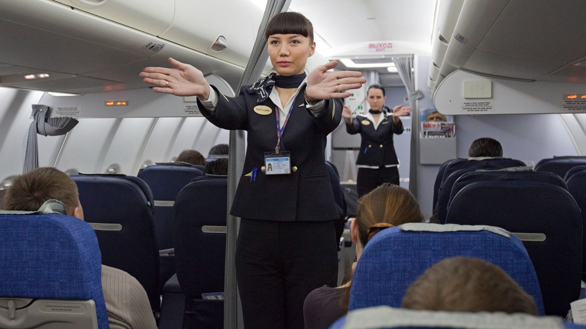 File:Flight attendants performing a pre-flight safety demonstration on an Aeroflot Sukhoi Superjet.jpg