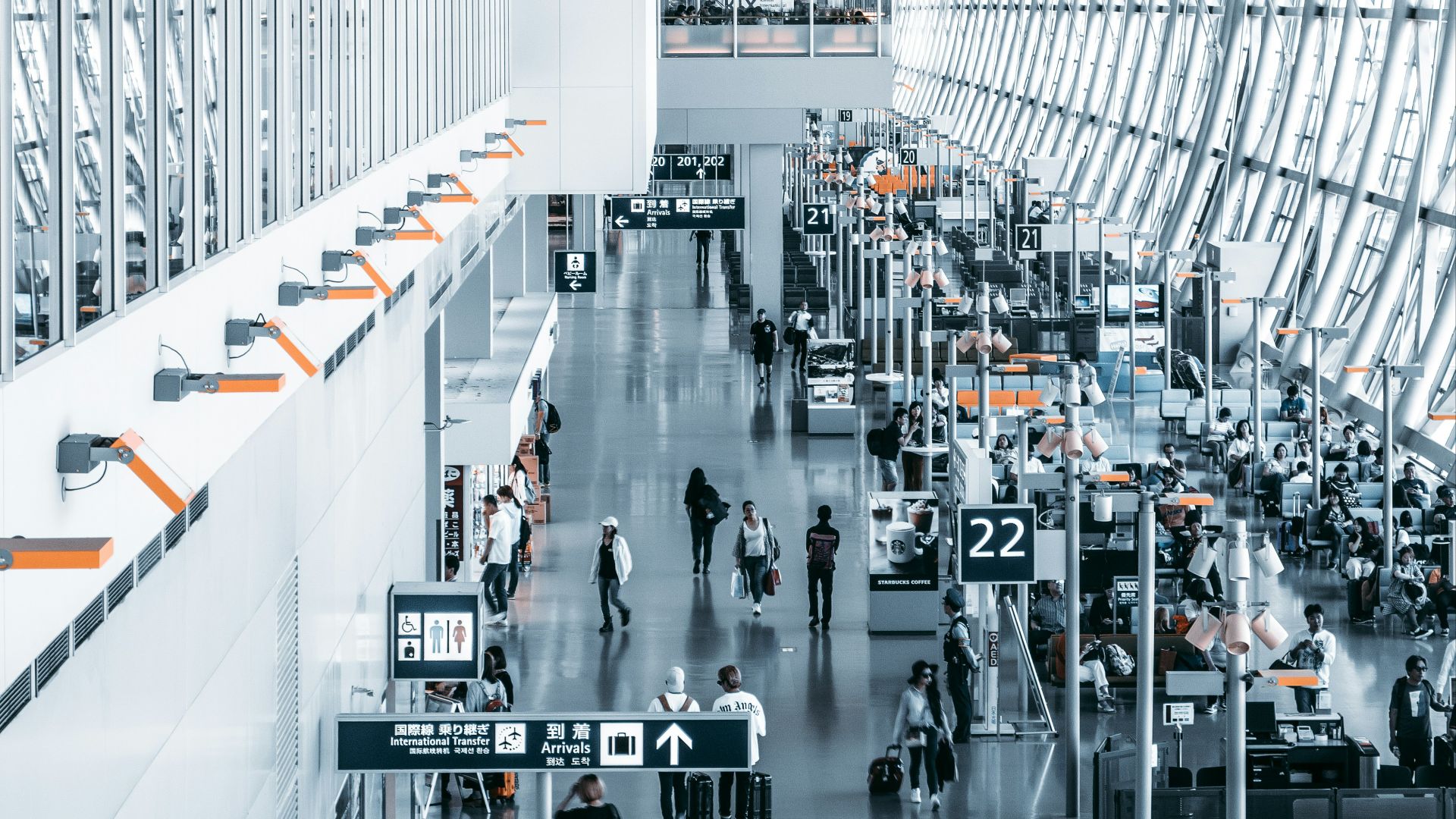 people walking inside airport station