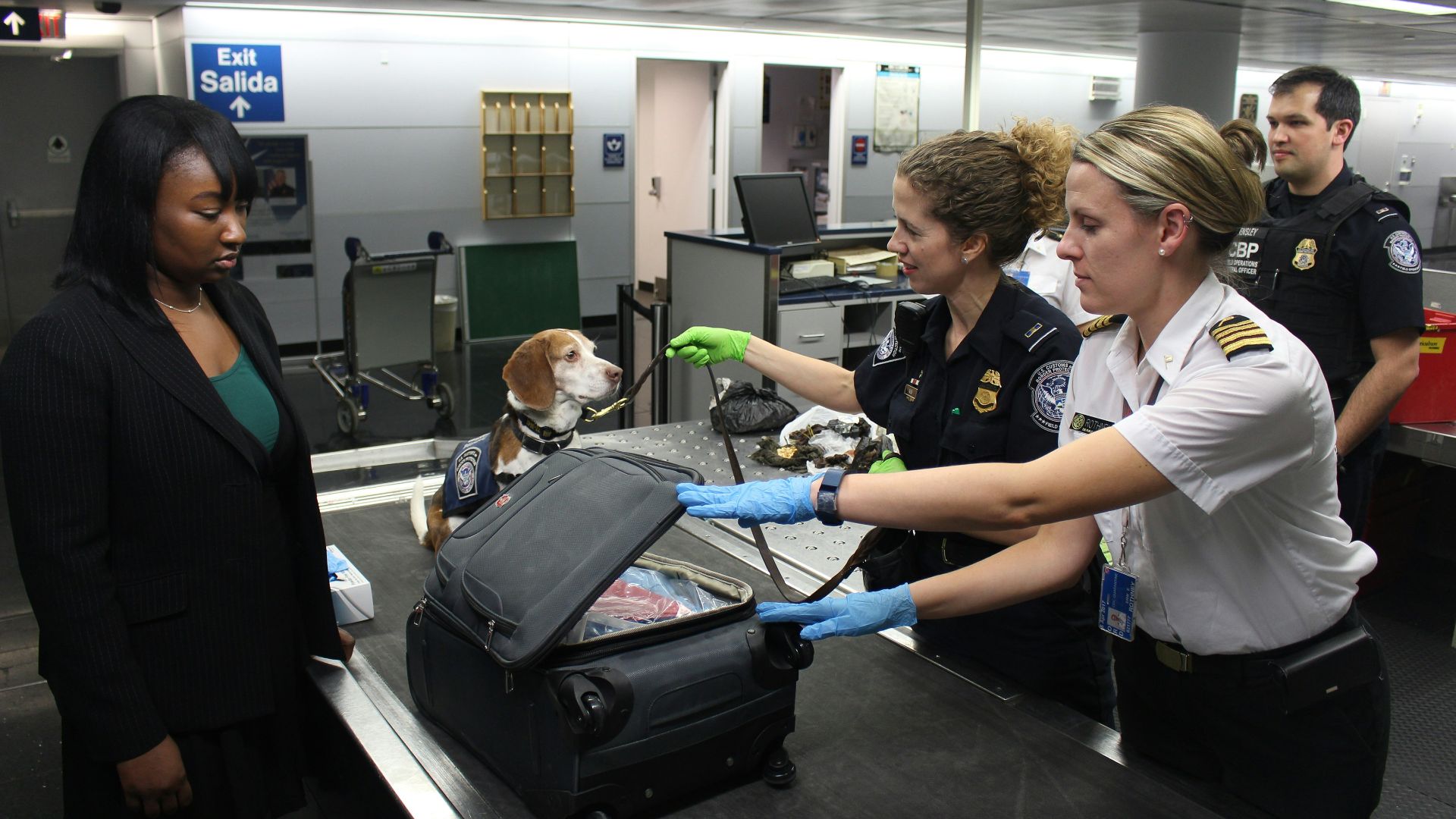 woman in black crew neck t-shirt standing beside woman in white t-shirt