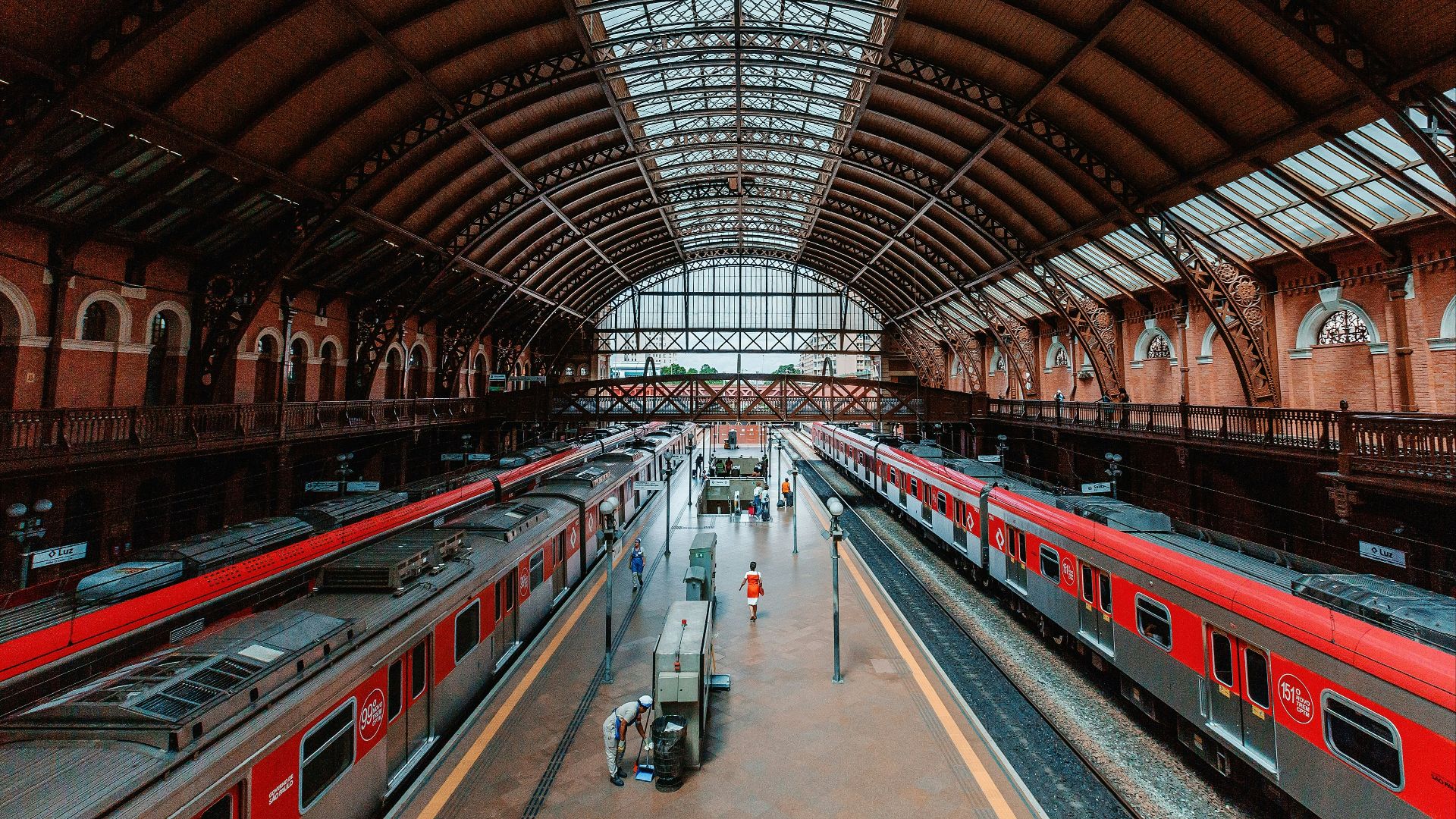 red and white train in train station