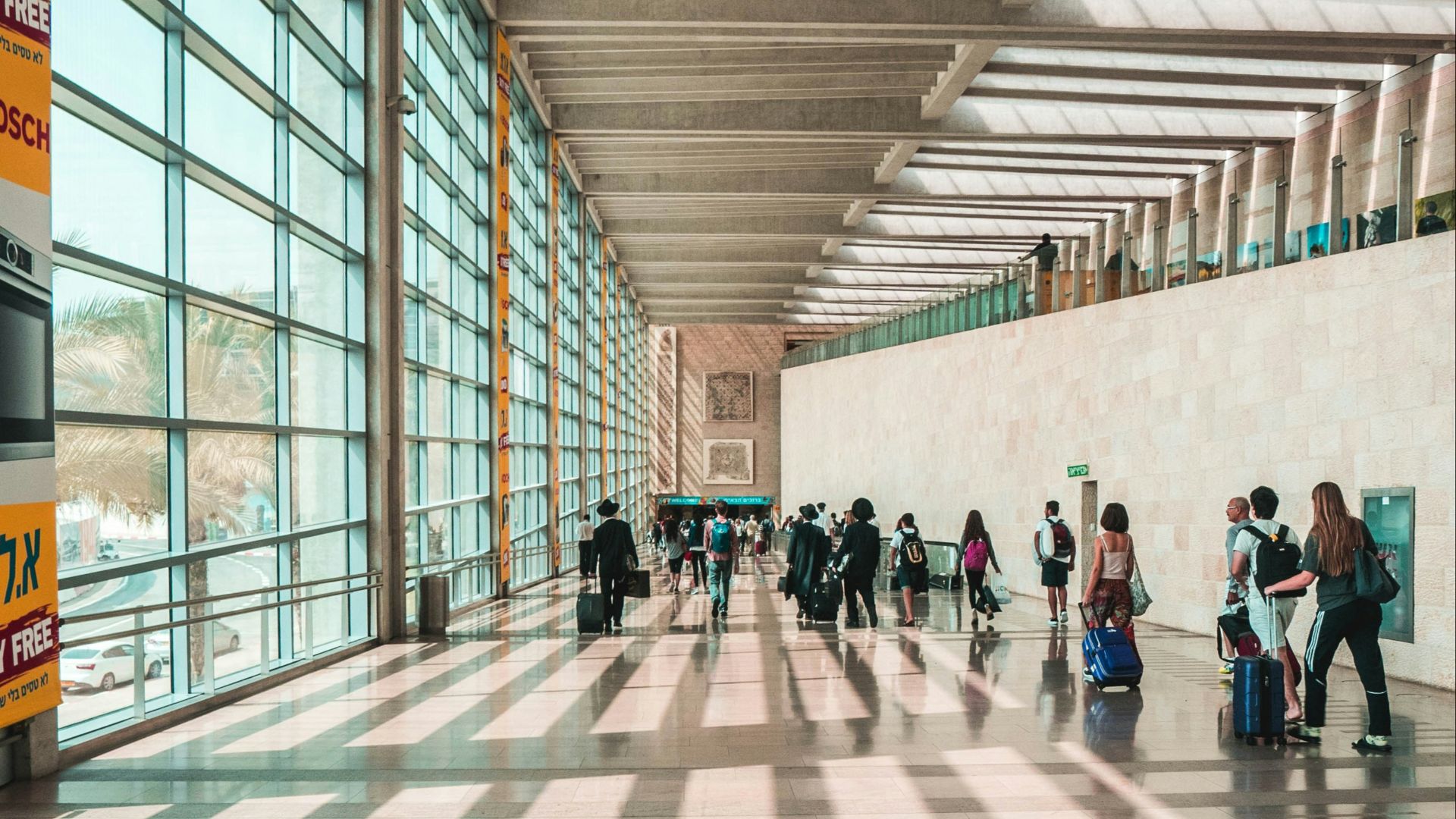 people walking on hallway during daytime