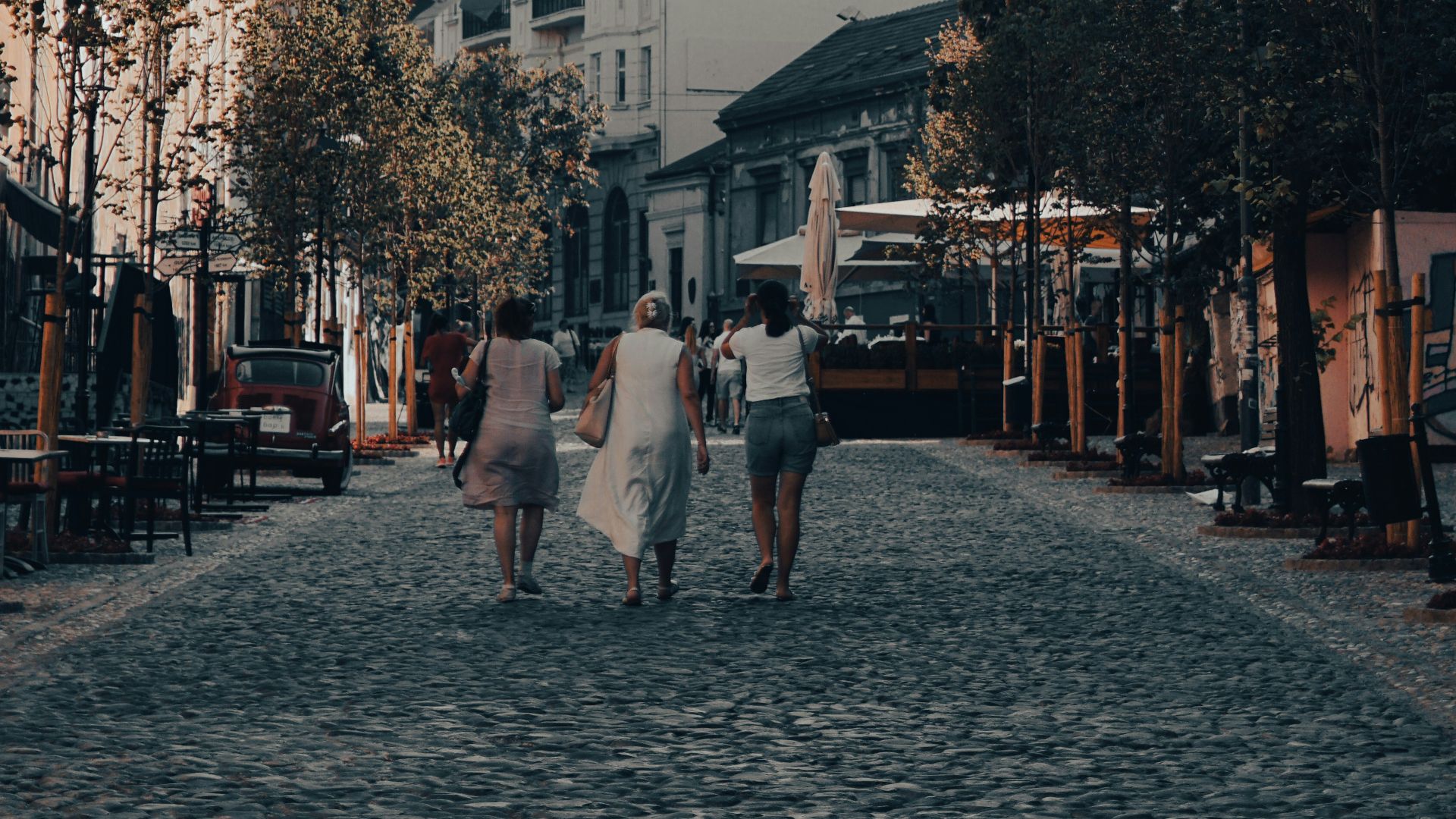 green trees near white concrete building during daytime