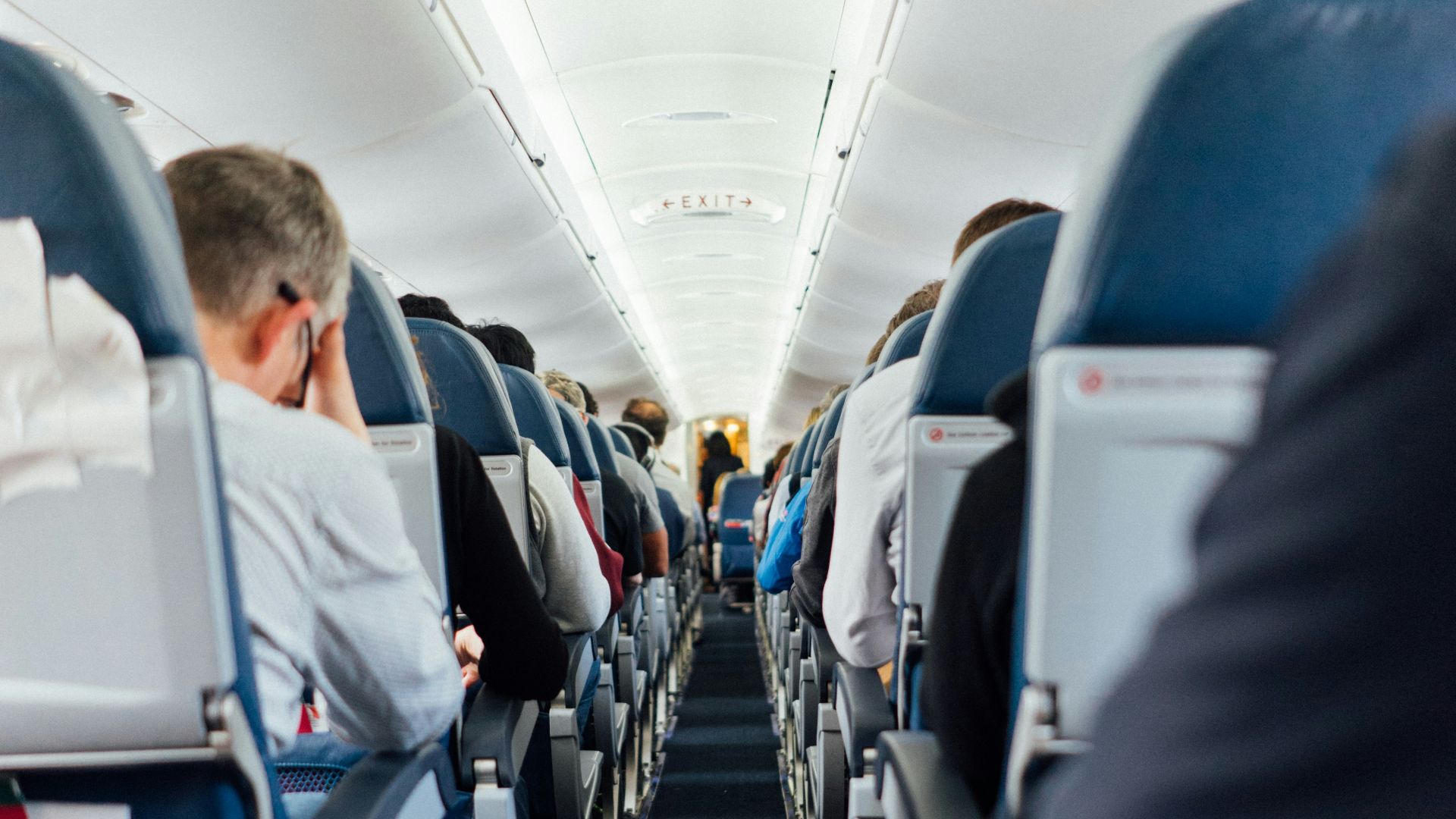 people sitting inside plane