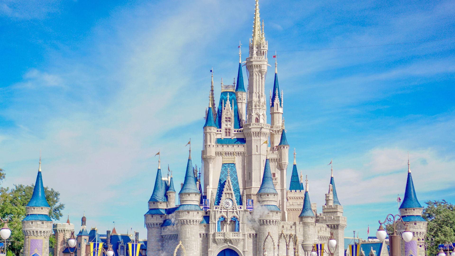 a large castle with a lot of people around it