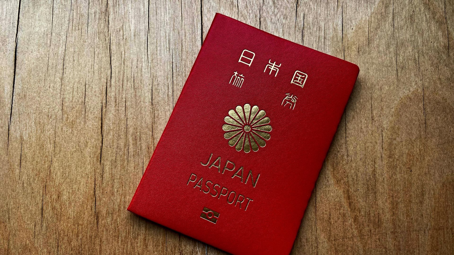 File:Japanese passport on a table.jpg