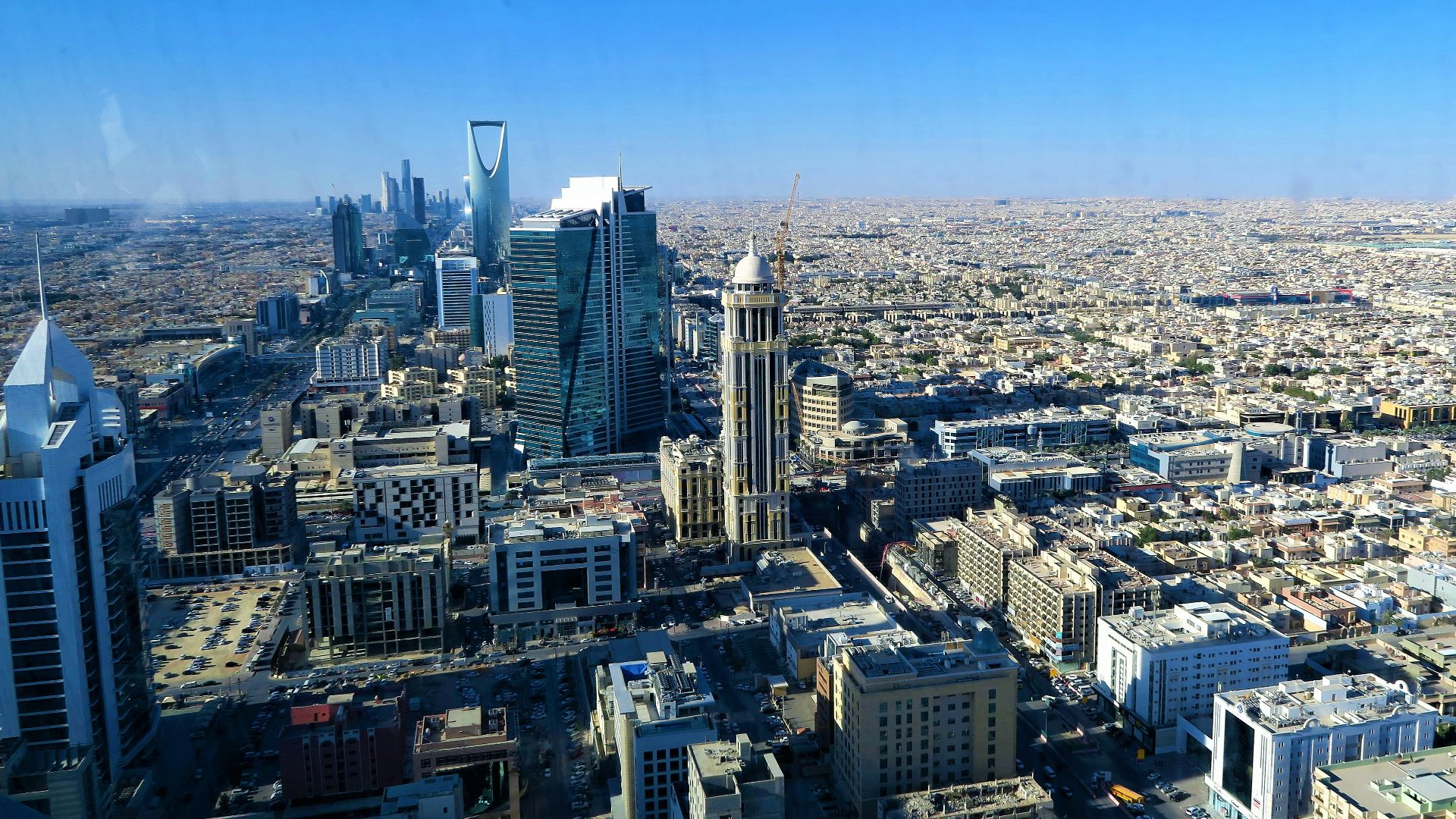 a view of a city from the top of a building