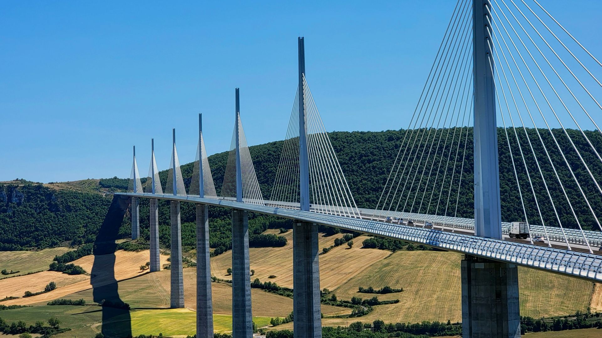 a very long bridge spanning over a valley