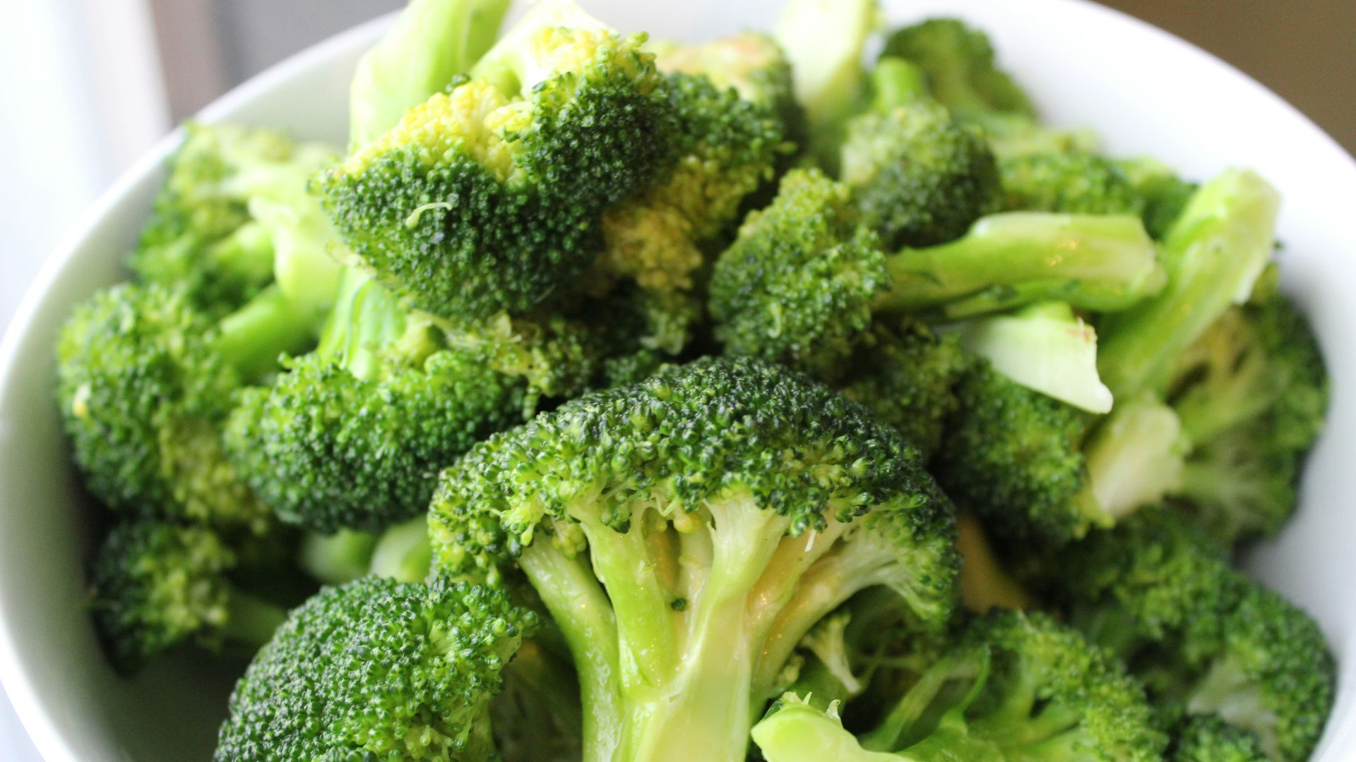 green broccoli on white ceramic plate