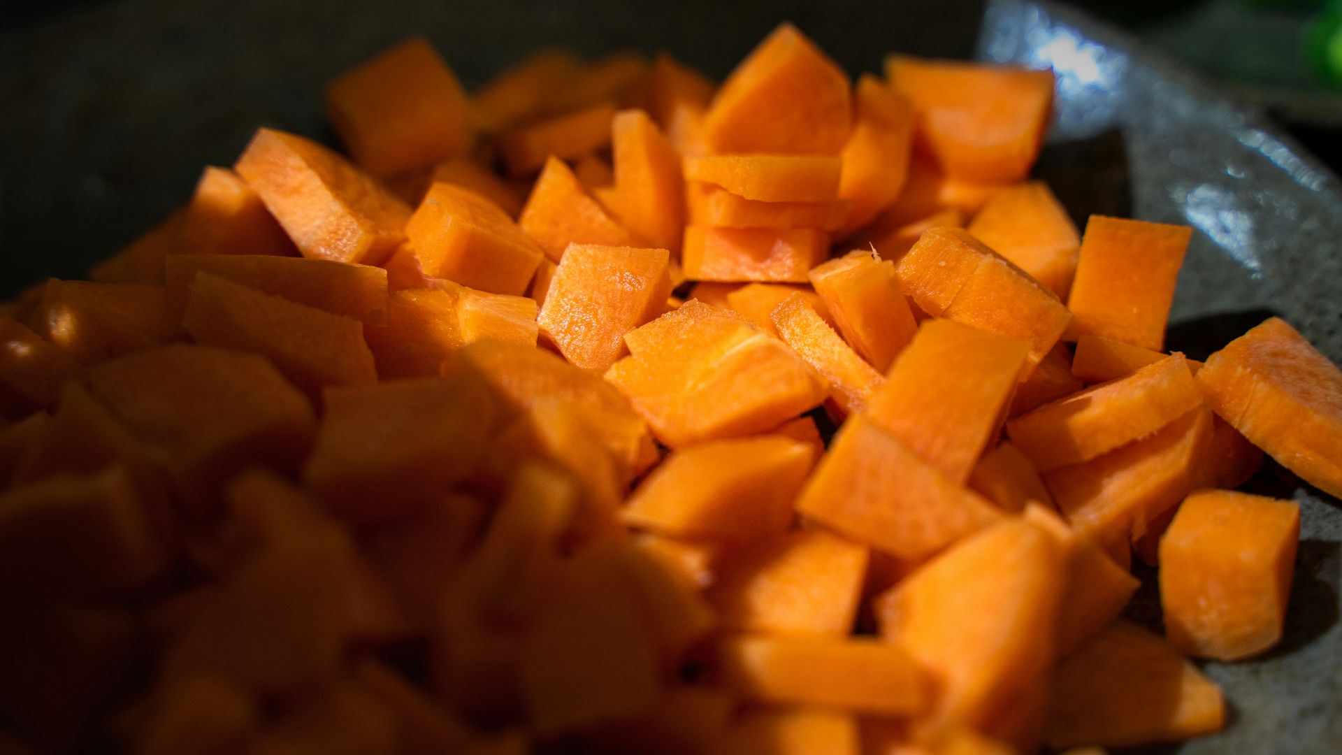 a pile of cut up carrots on a plate
