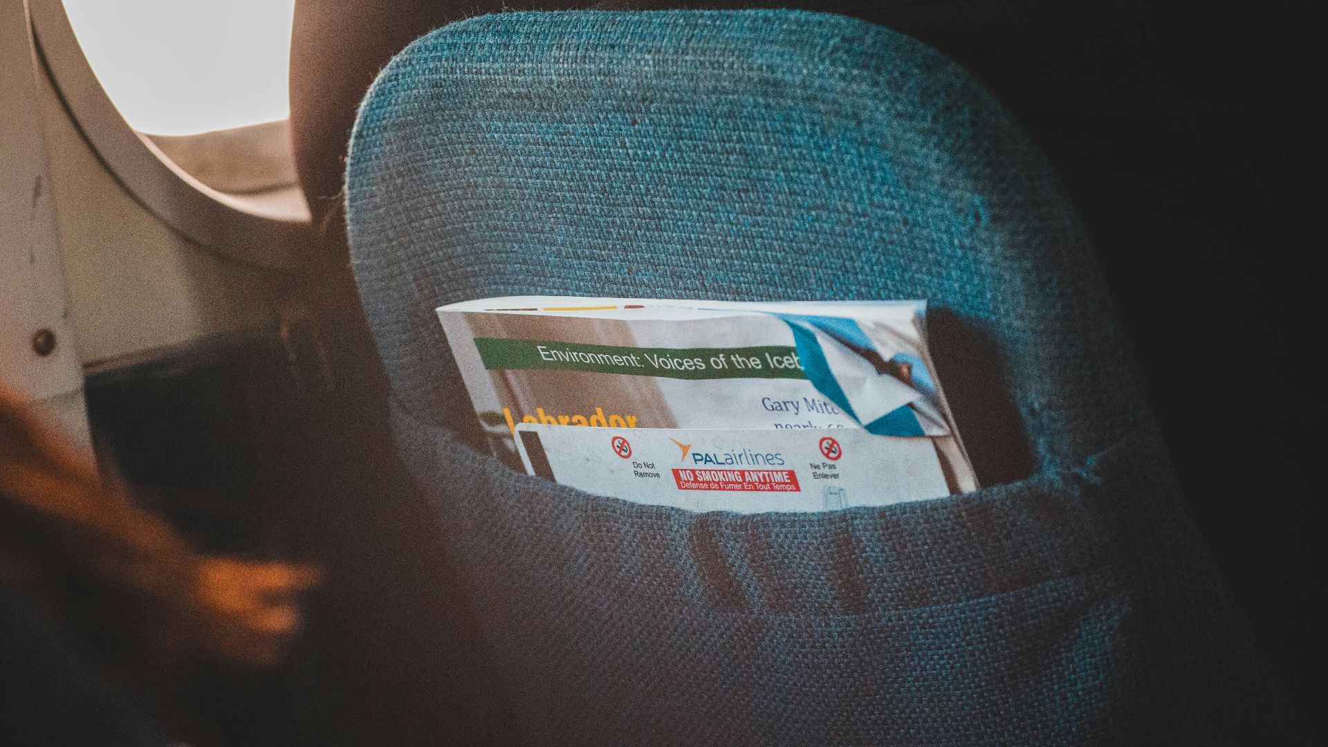 white magazine on chair