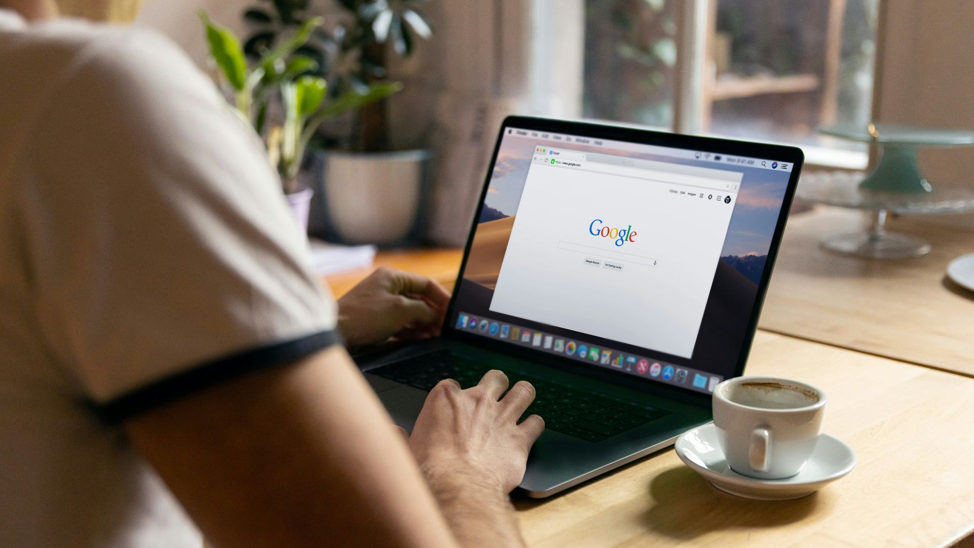 person using black laptop computer