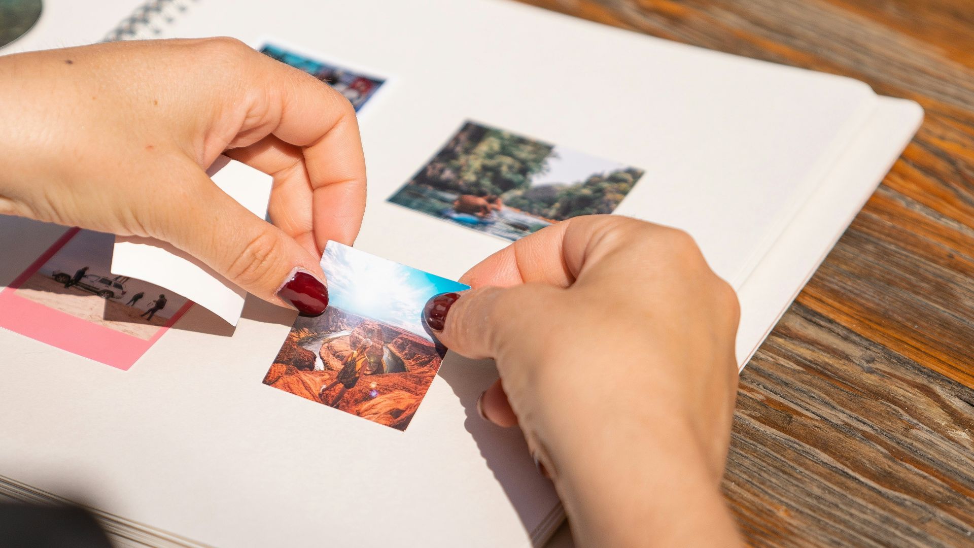 a person holding a toothbrush over a book