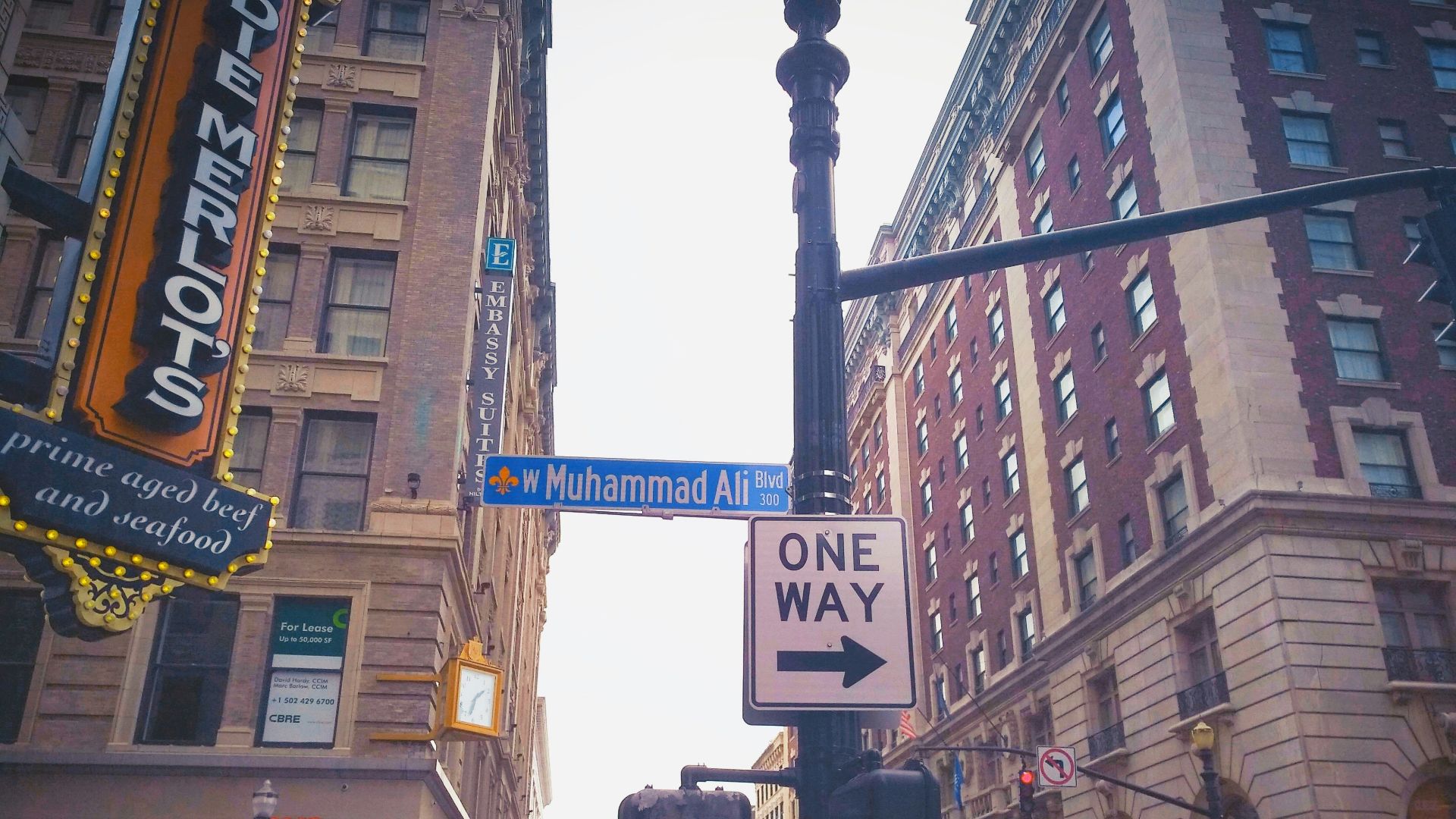 white and black street sign
