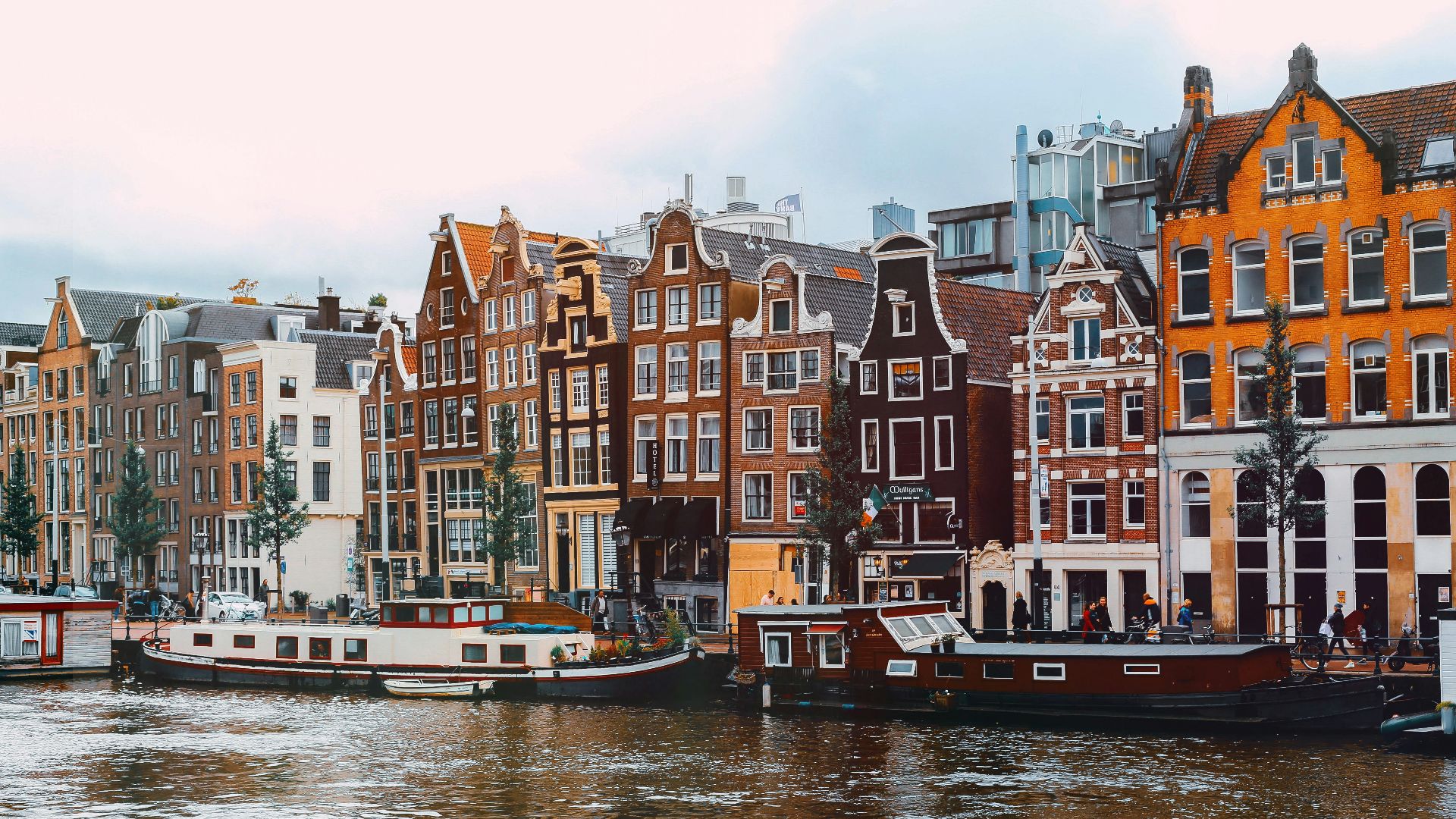 a group of boats that are sitting in the water