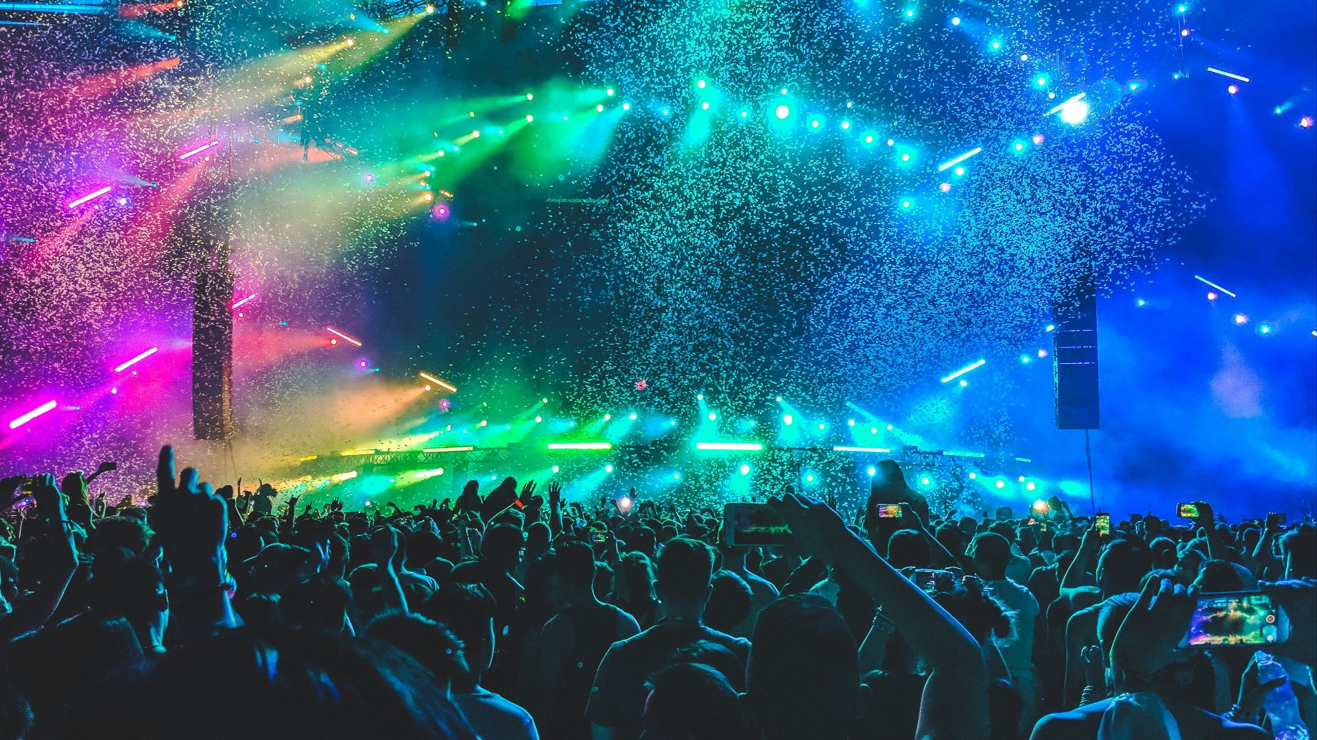 group of people in front of stage