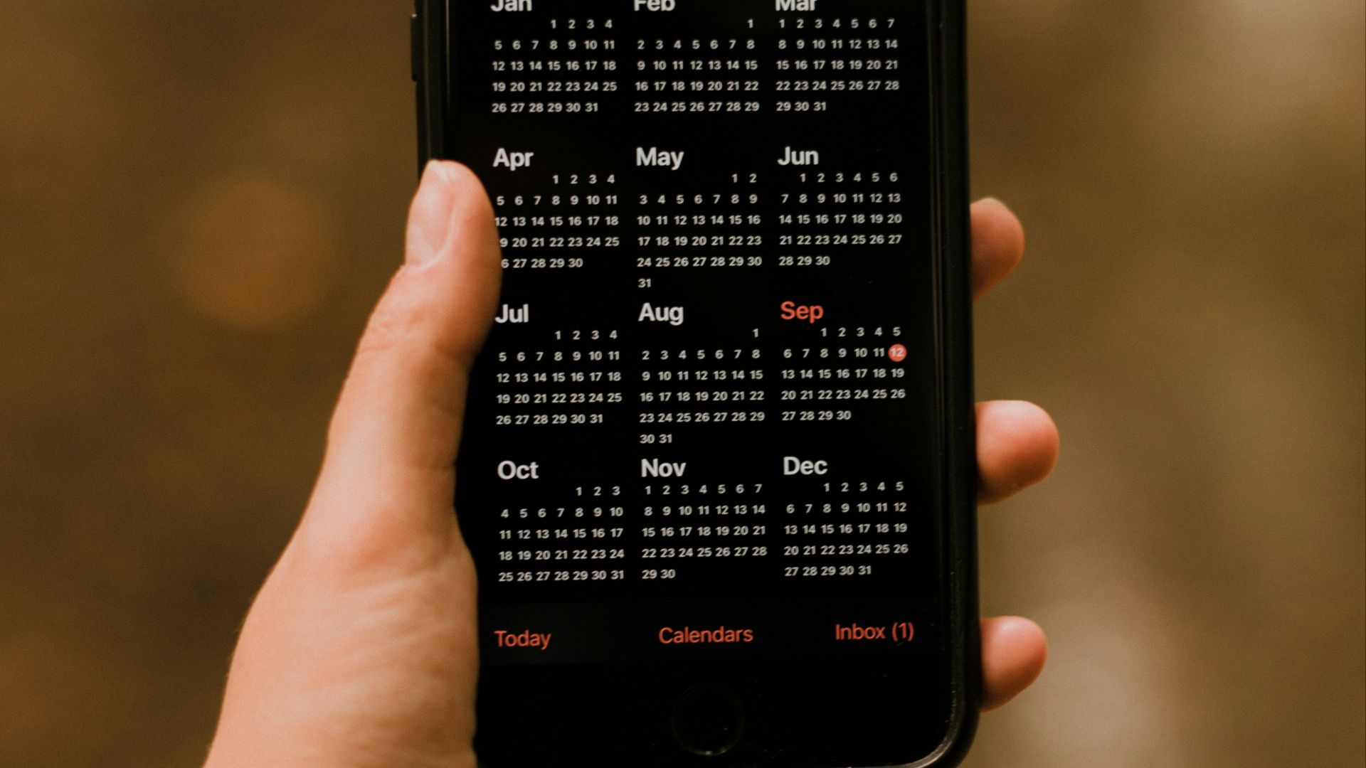 person holding black android smartphone