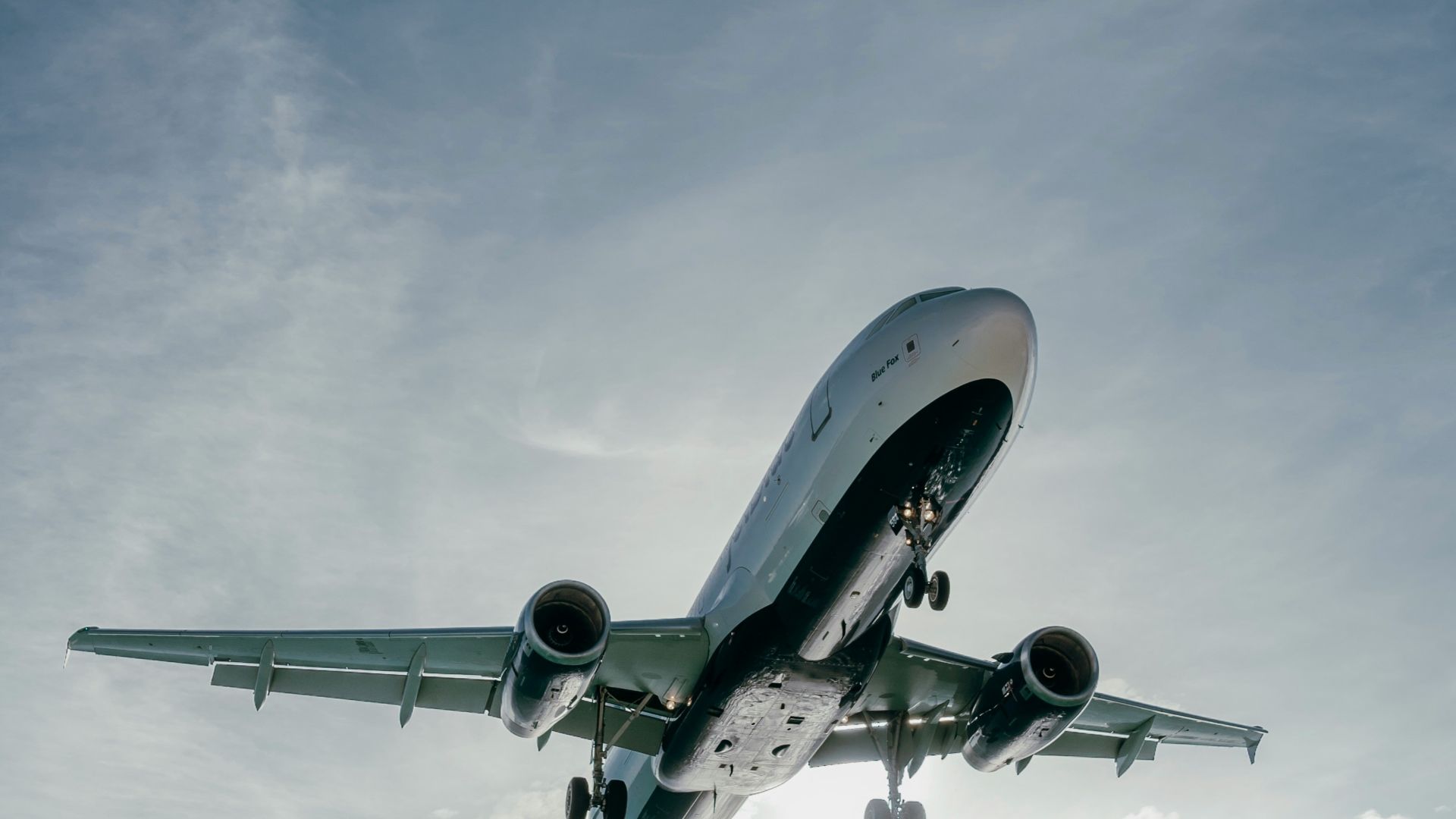 a plane flying over water