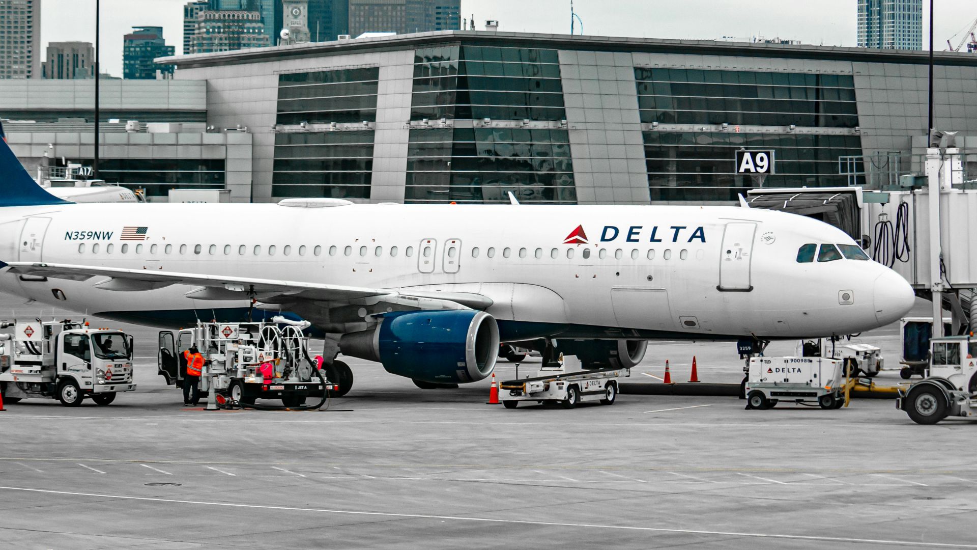 white passenger plane on airport during daytime