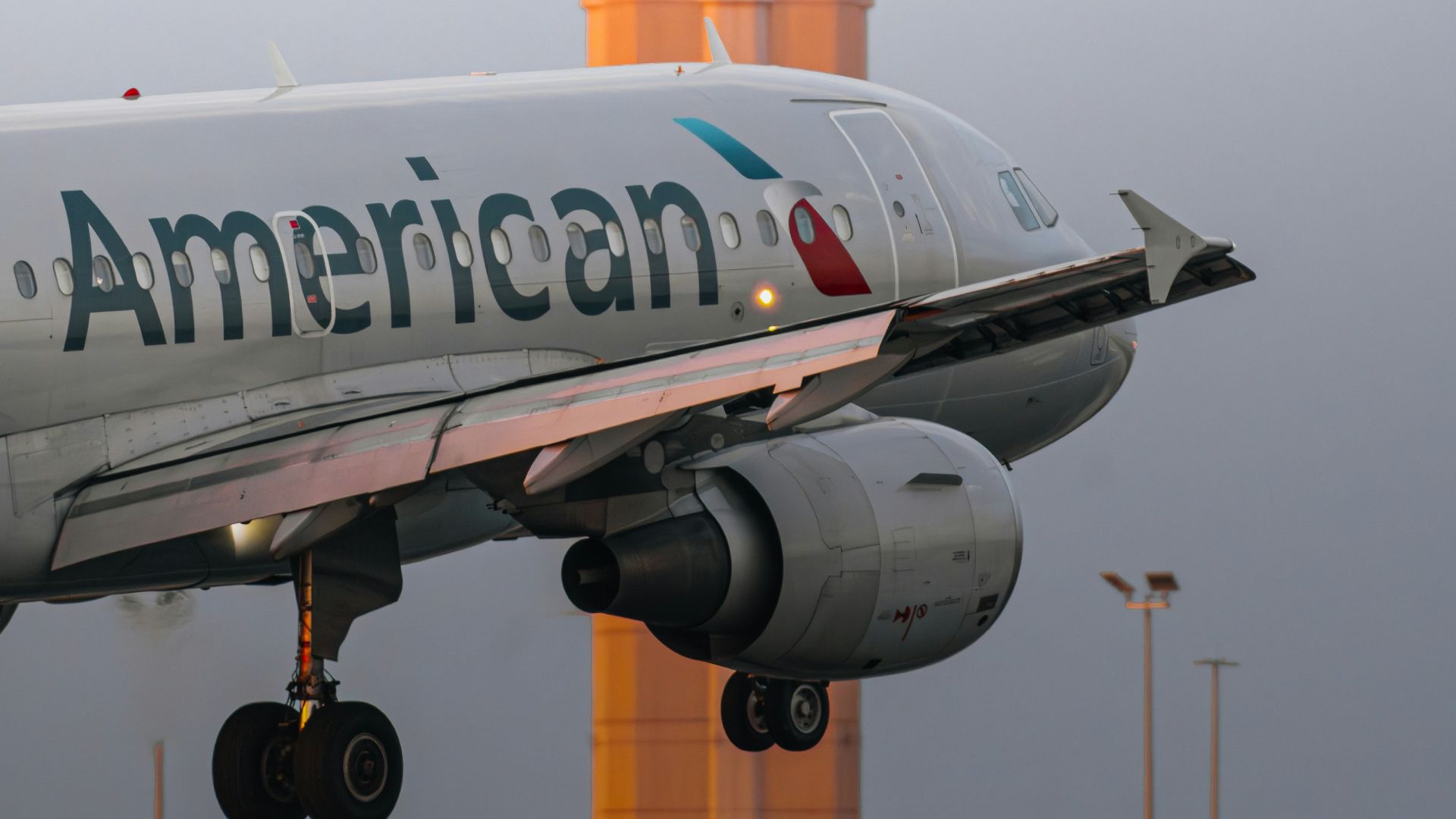an american airlines jet taking off from an airport