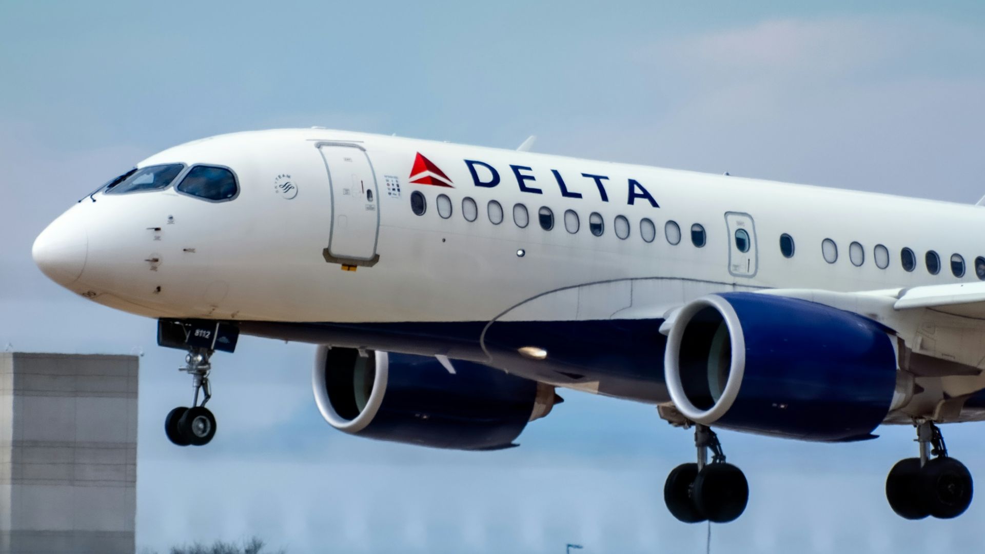 white passenger plane in the sky during daytime