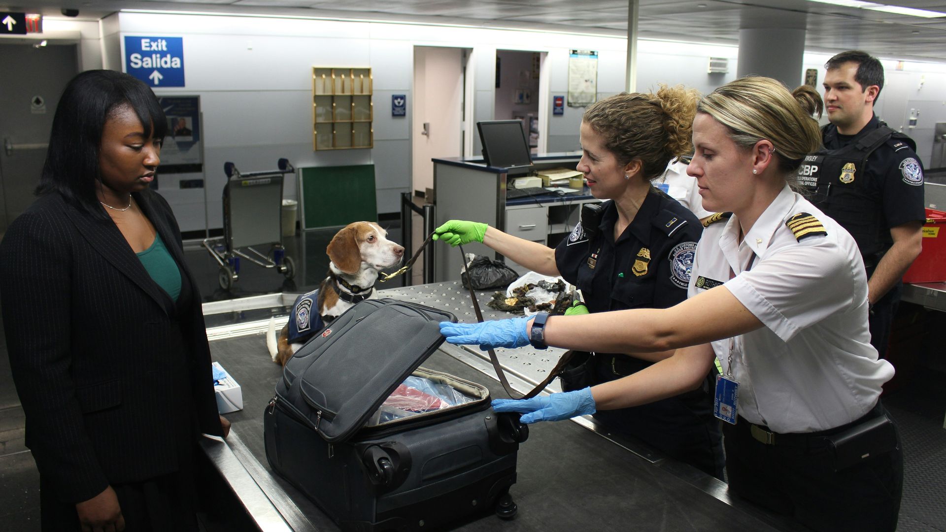 woman in black crew neck t-shirt standing beside woman in white t-shirt