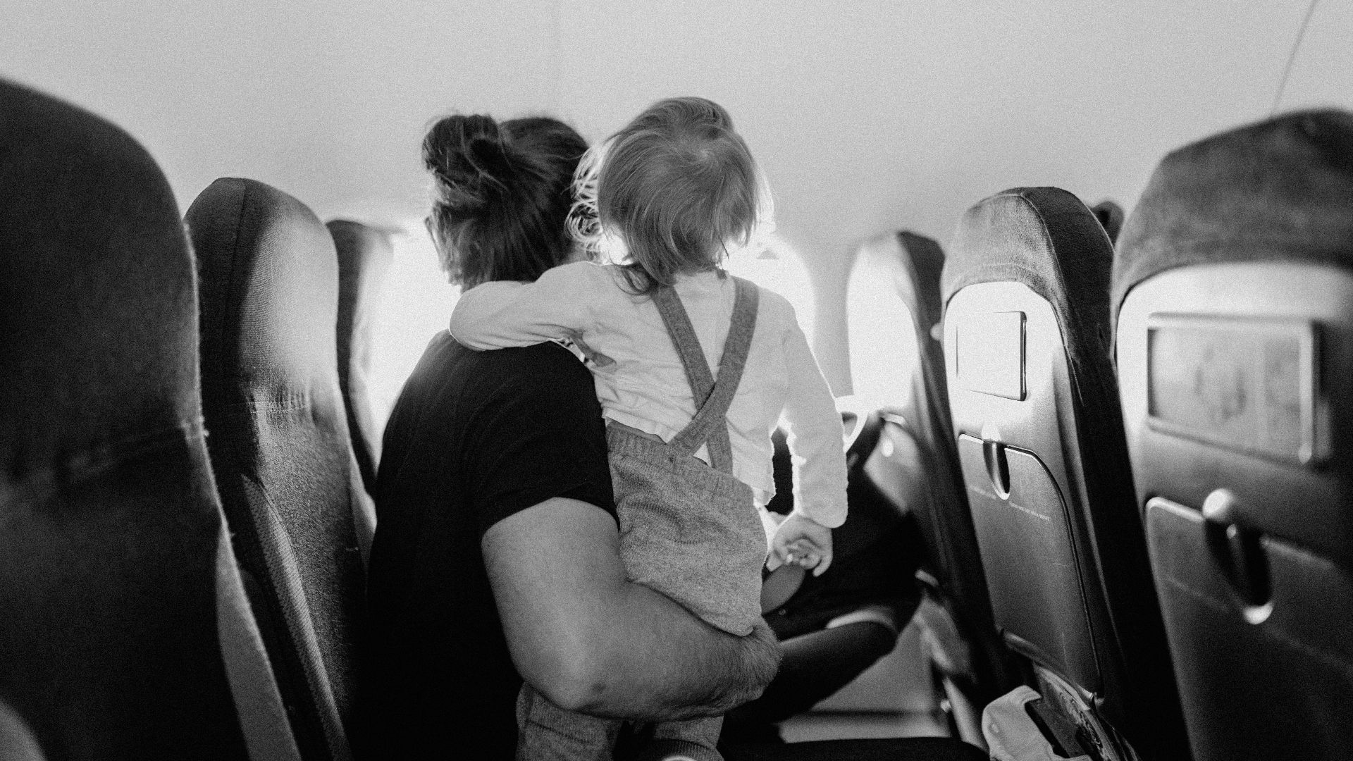 a man and woman kissing