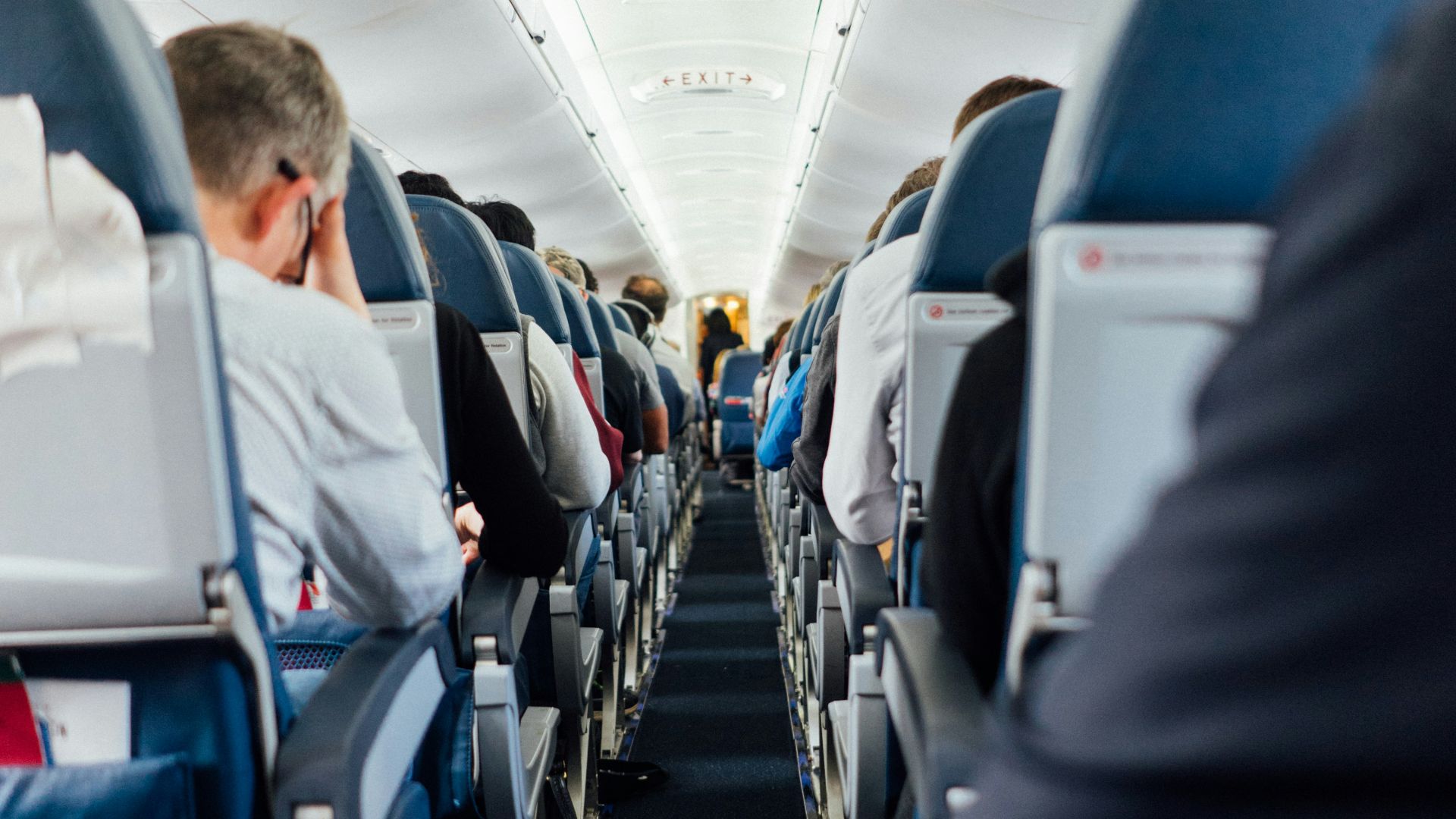 people sitting inside plane