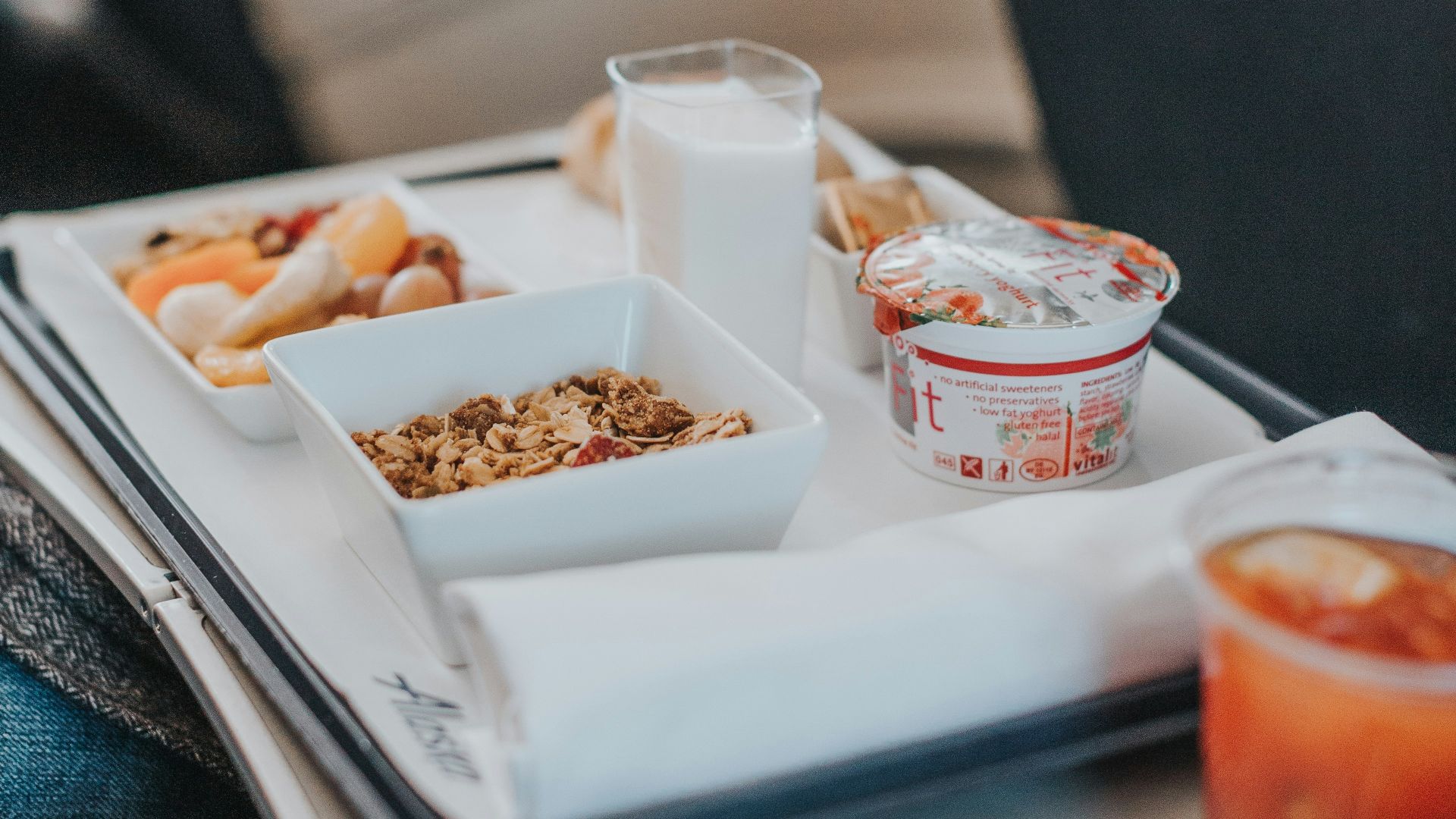 red liquid on cup beside bowl