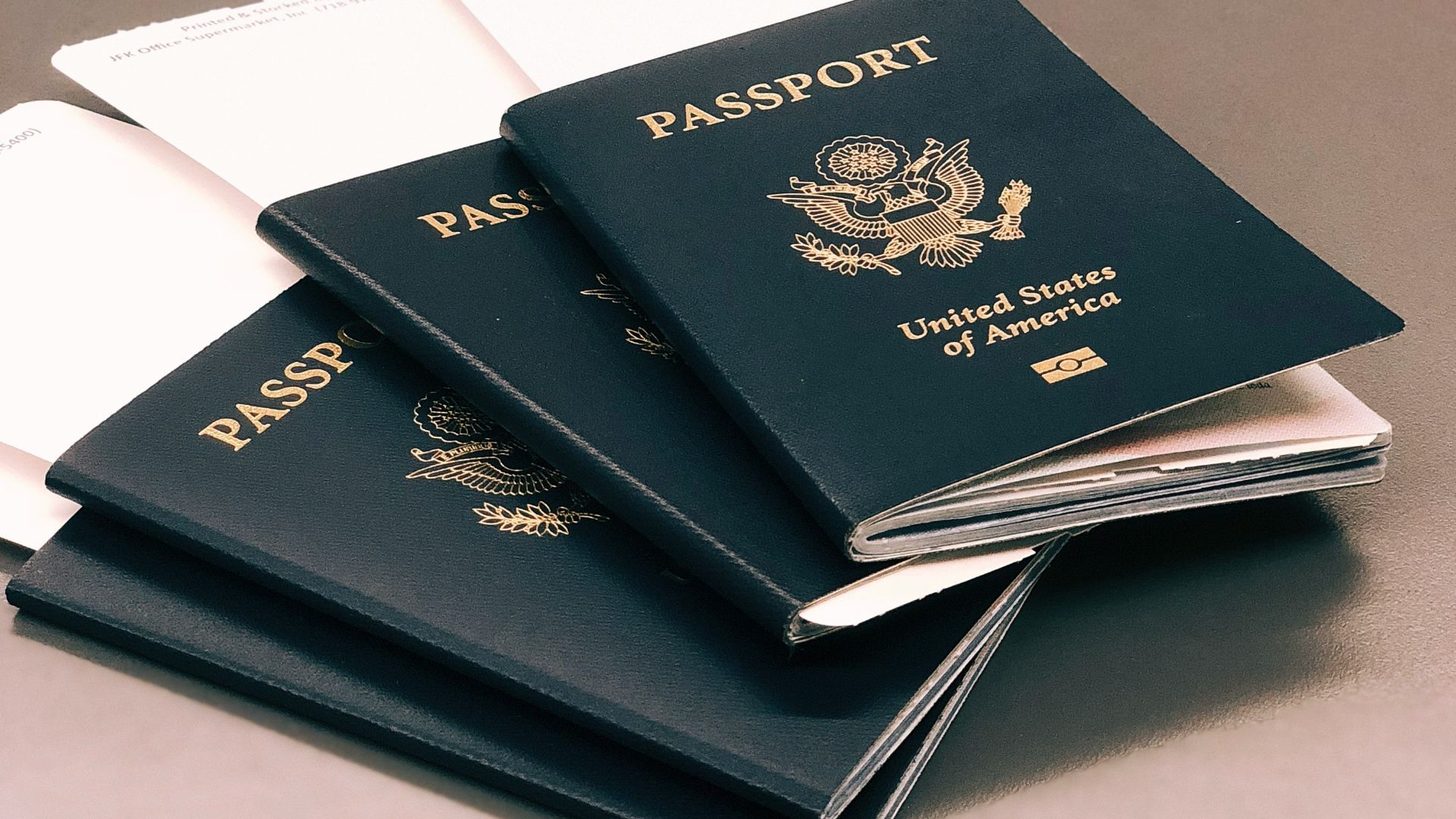 four green Passports