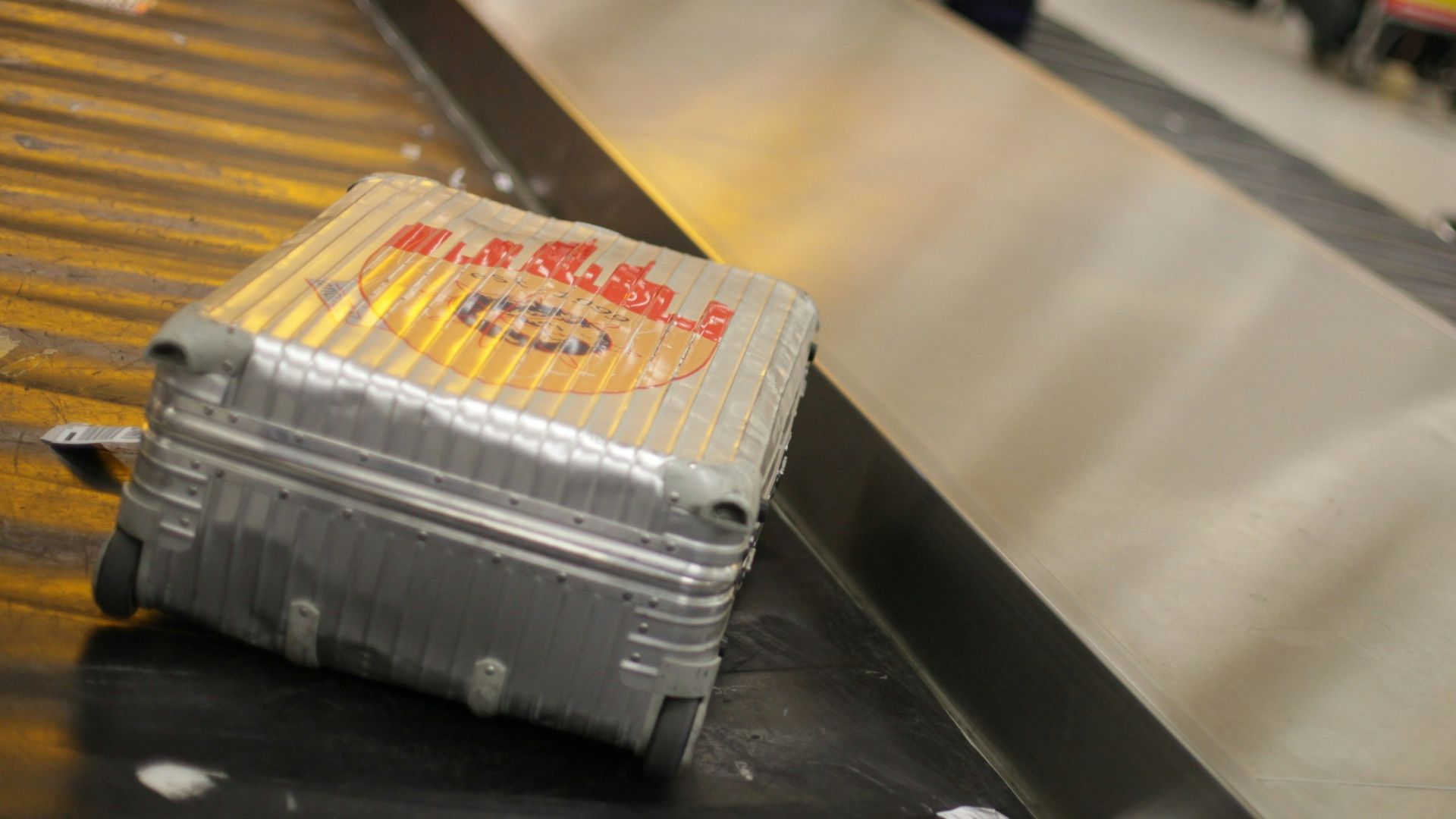 gray hardside luggage