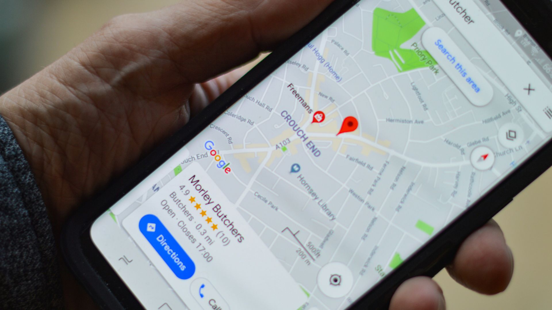 person holding black smartphone