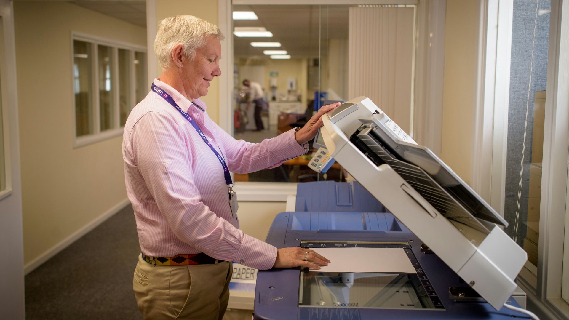 a person holding a tablet