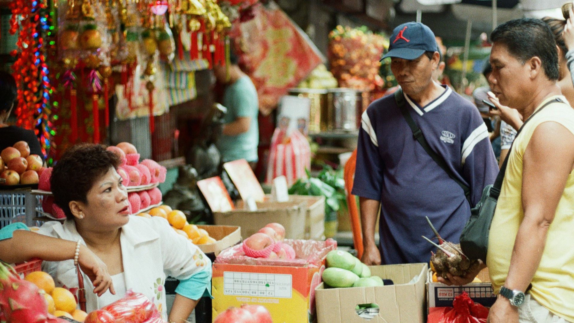 man standing in front of woman