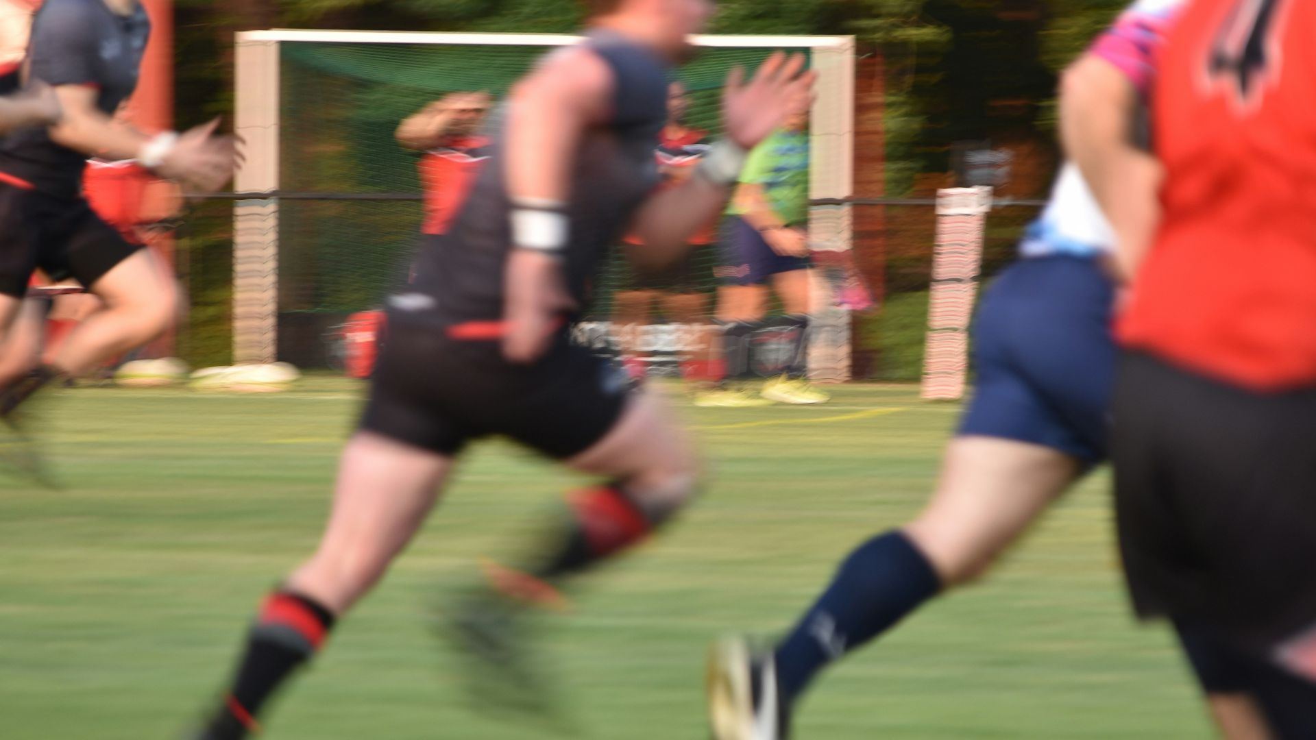a group of men playing a game of soccer