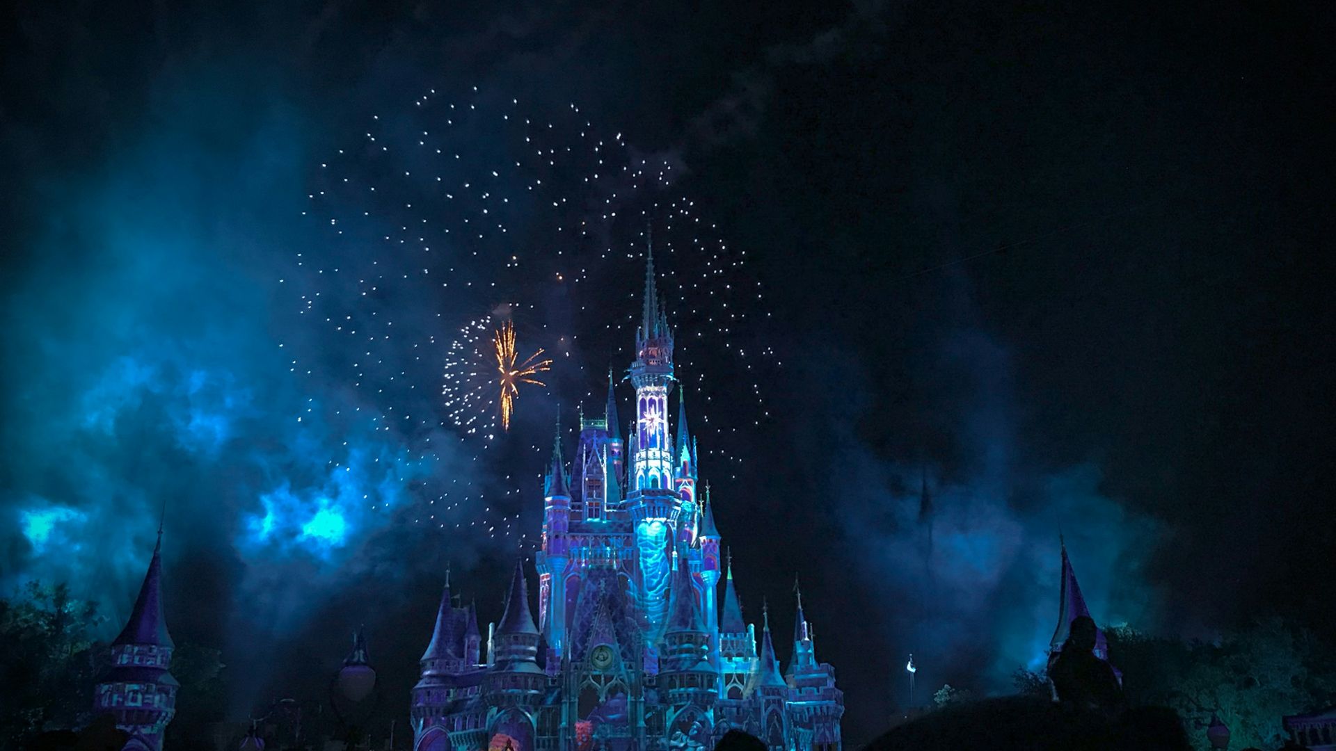 crystal castle with fireworks at night