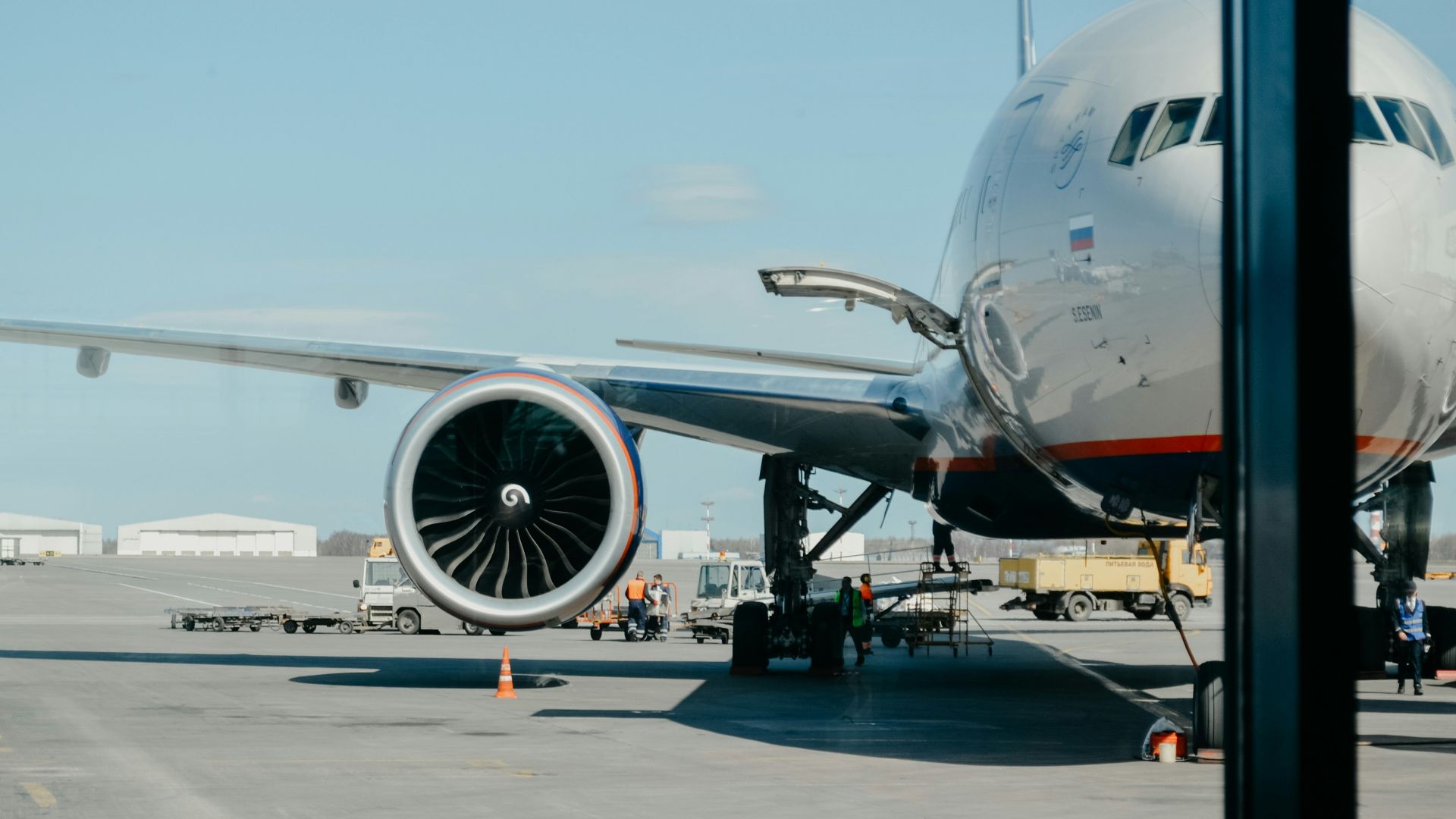 white airliner on runway