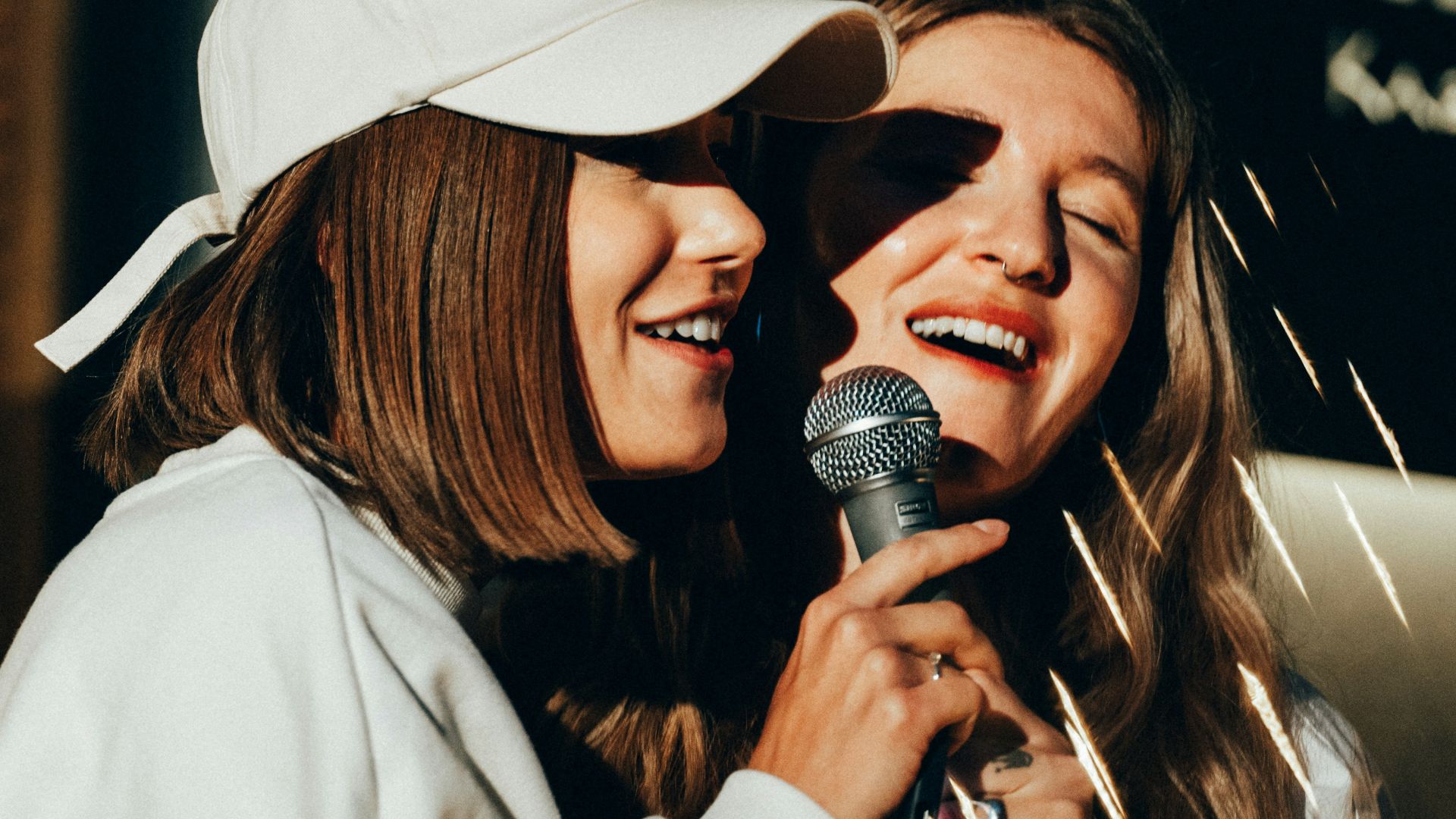 a couple of women standing next to each other
