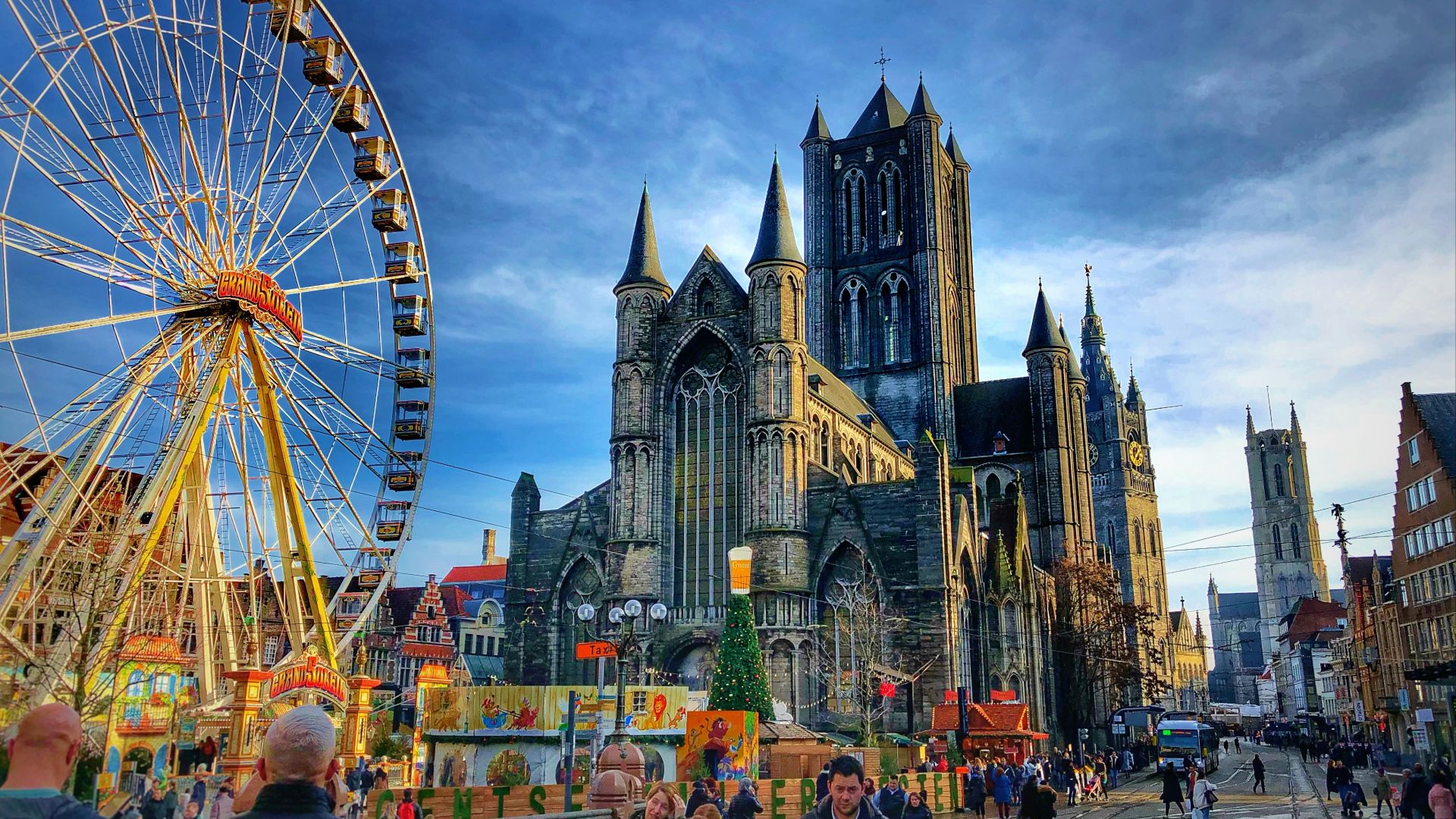 people walking near ferries wheel